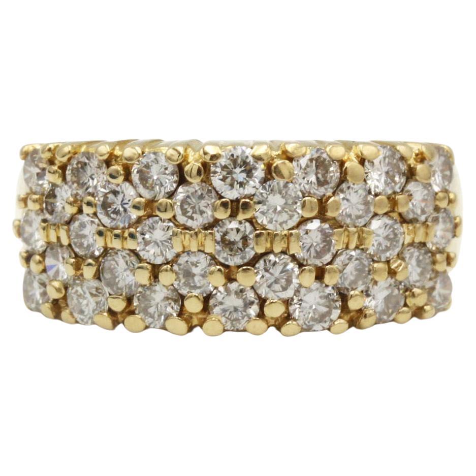 Fascia con pavé di 33 diamanti di fine secolo in oro giallo 18 K.