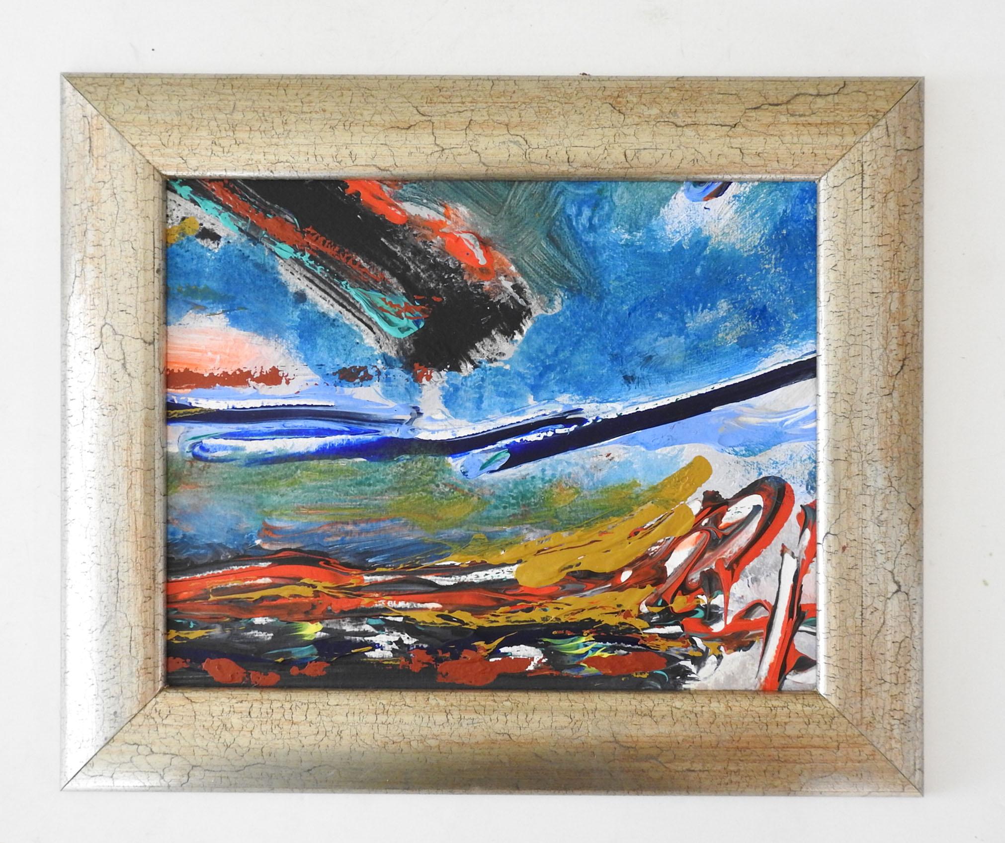 Late 20th century acrylic on paper abstract expressionist painting in blue, ochre and red. Unsigned. Displayed in champagne crackle finish wood frame, scuffing to frame.