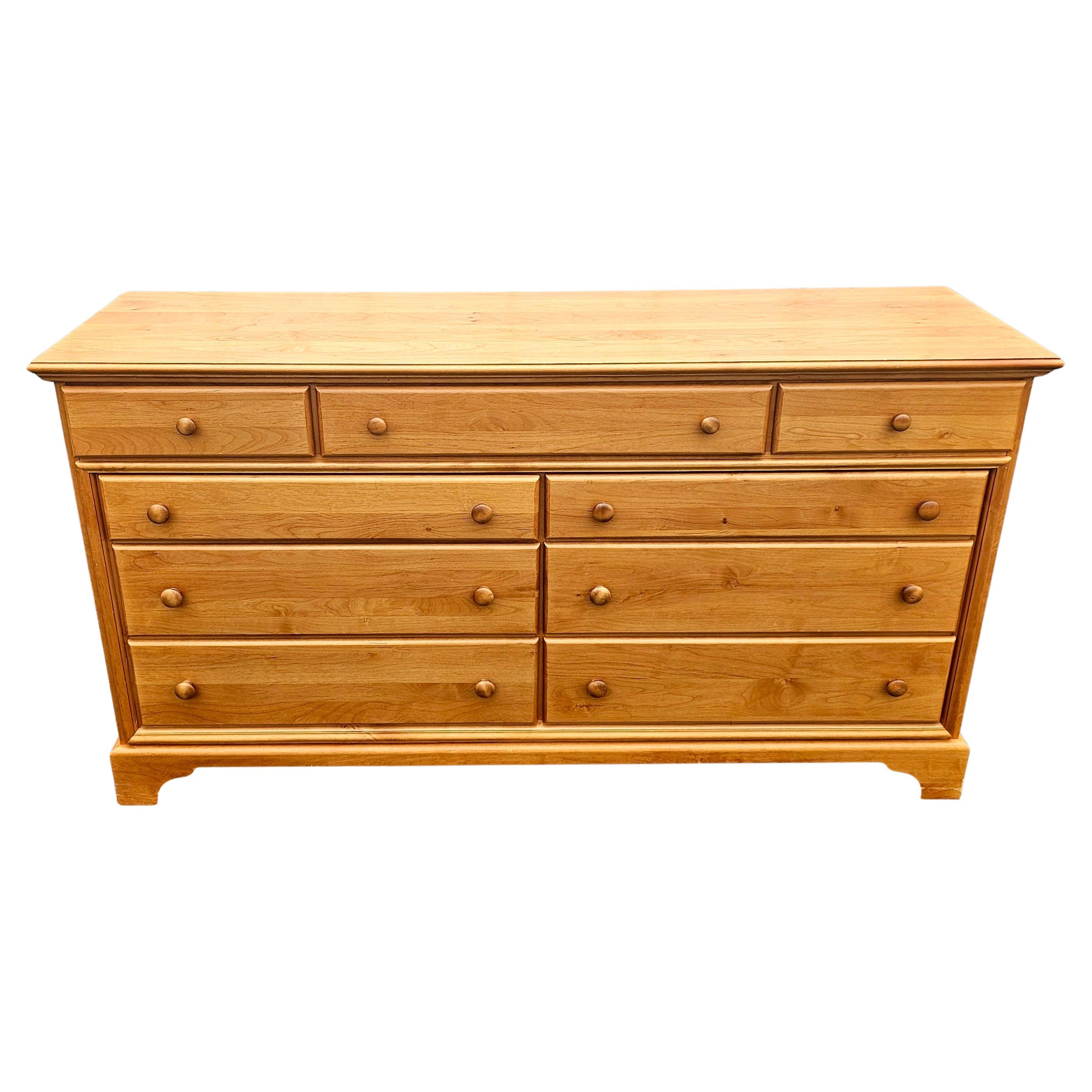 Late 20th Century American Classical Maple Double Dresser with clean lines and wooden knob drawer pulls.
Measures 66