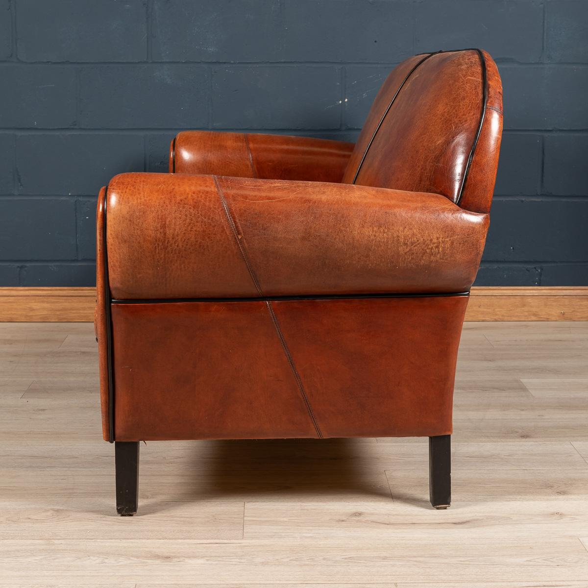 A an extremely good quality sheepskin leather three seater sofa in rich tan leather, manufactured in Holland and of the finest quality with great patina. Fantastic look for any interior, both modern and traditional.

Please note that our interior