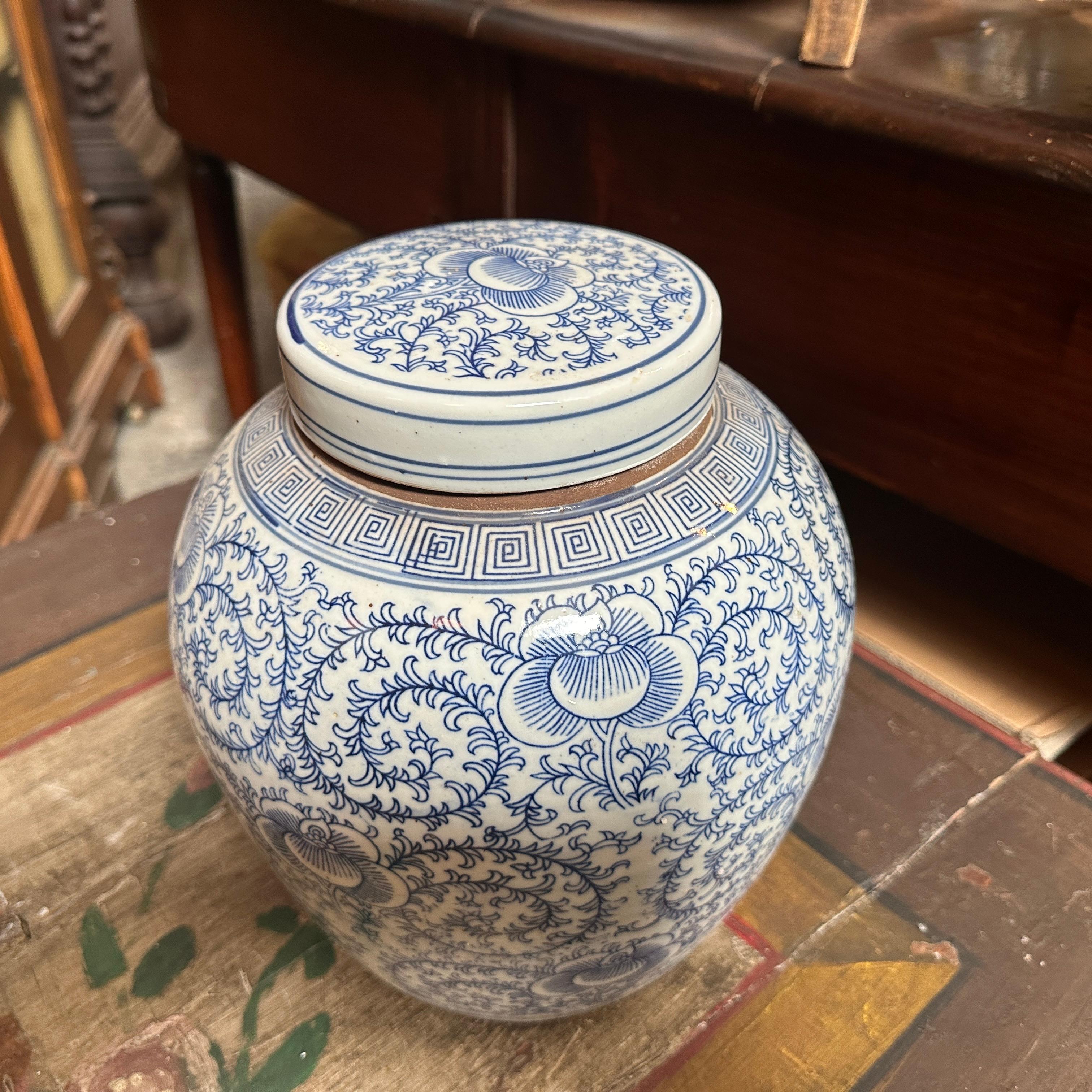 A blue and white ceramic ginger jar hand-crafted and painted in China in the second part of 20th century, it's in original condition with normal signs of age. Blue and white ceramics have a long history in Chinese porcelain, dating back to the Yuan