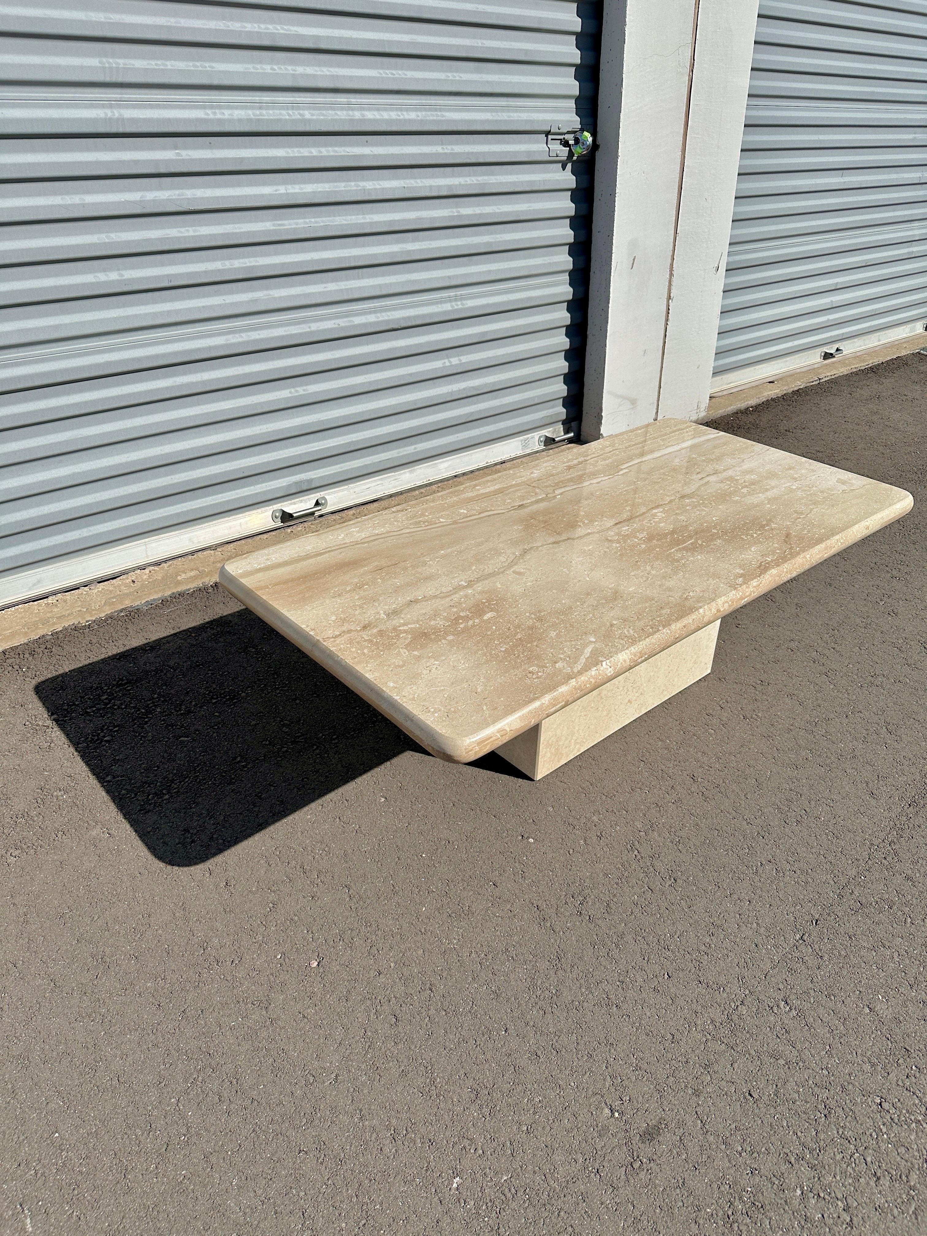 This late 20th century Breccia Sarda marble coffee table pairs architectural form with the quiet drama of natural stone. Quarried in Sardinia, the limestone-based marble reveals a nuanced palette of beige, cream, soft taupe, and golden