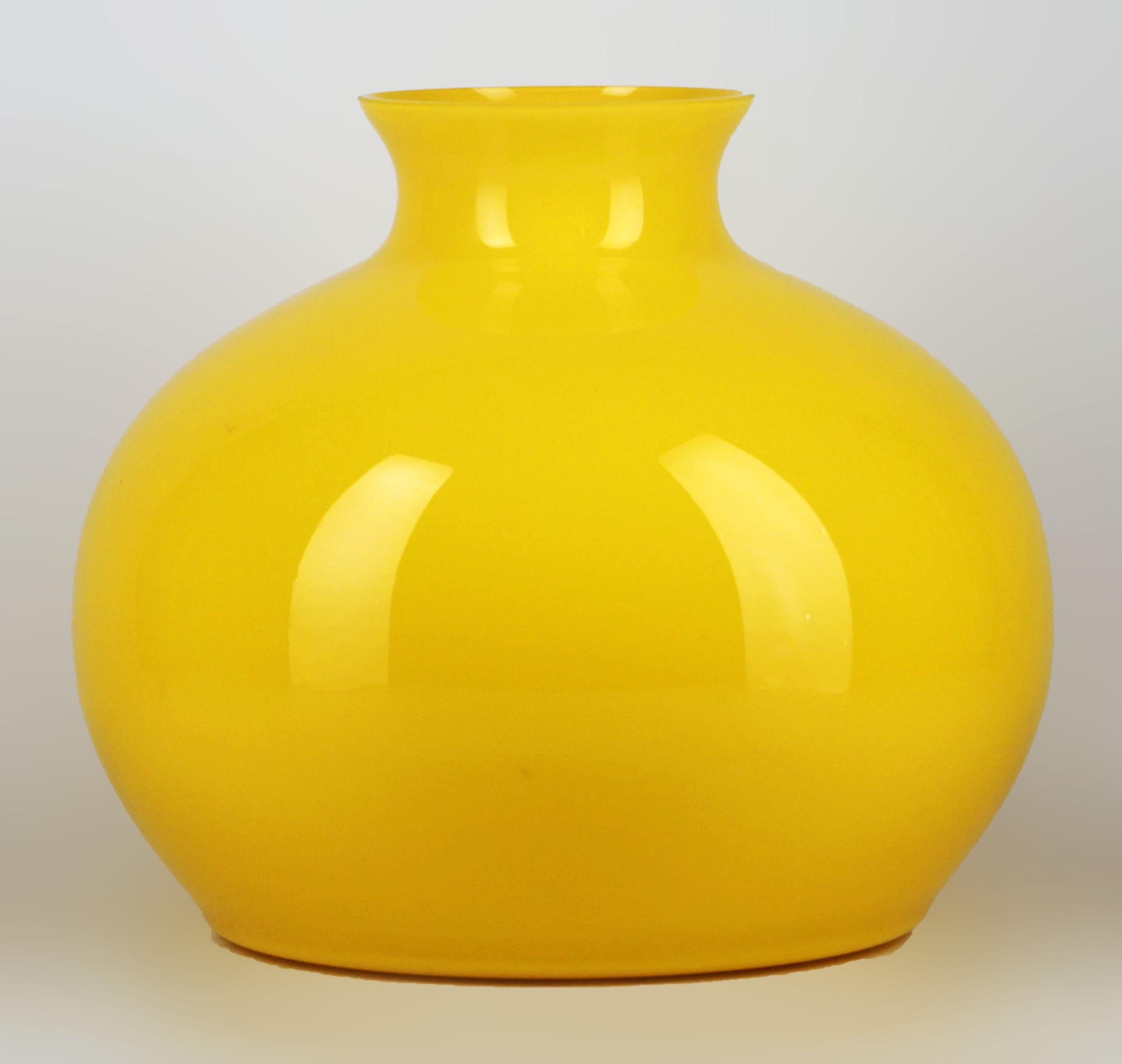 Late 20th century bulbous polished glass yellow vase of scandinavian design

By: unknown
Material: glass, enamel
Technique: cast, enameled, glazed, polished
Dimensions: 11 in x 10 in
Date: late 20th century, circa 1970
Style: Space Age, Scandinavian