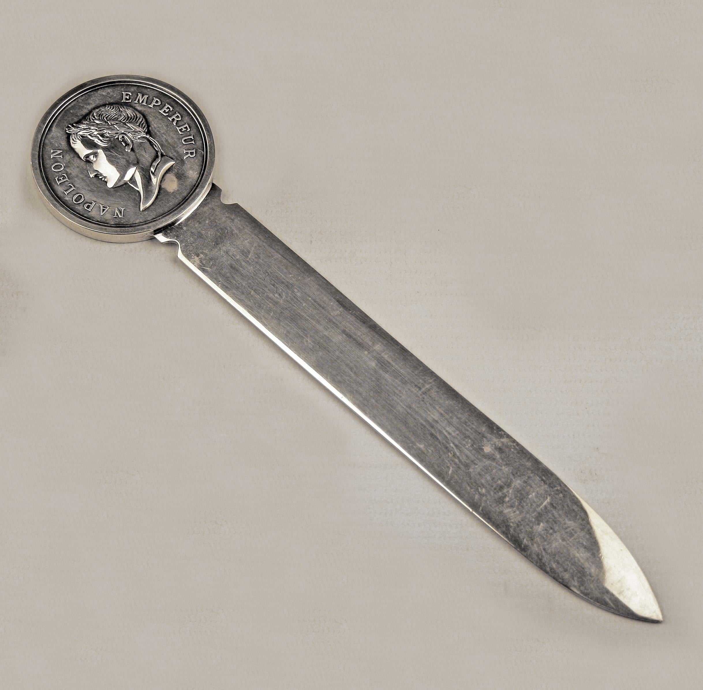 Late 20th century/circa 1970 silvered Napoleon Empereur letter opener by Christofle

By: Christofle
Material: silver, silver plate, metal, paper
Technique: polished, silvered, metalwork
Dimensions: 2 x 9 x 0.5
Date: late 20th century, circa