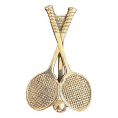 Bussola per porta a forma di doppia racchetta da tennis in ottone fuso, fine del XX secolo