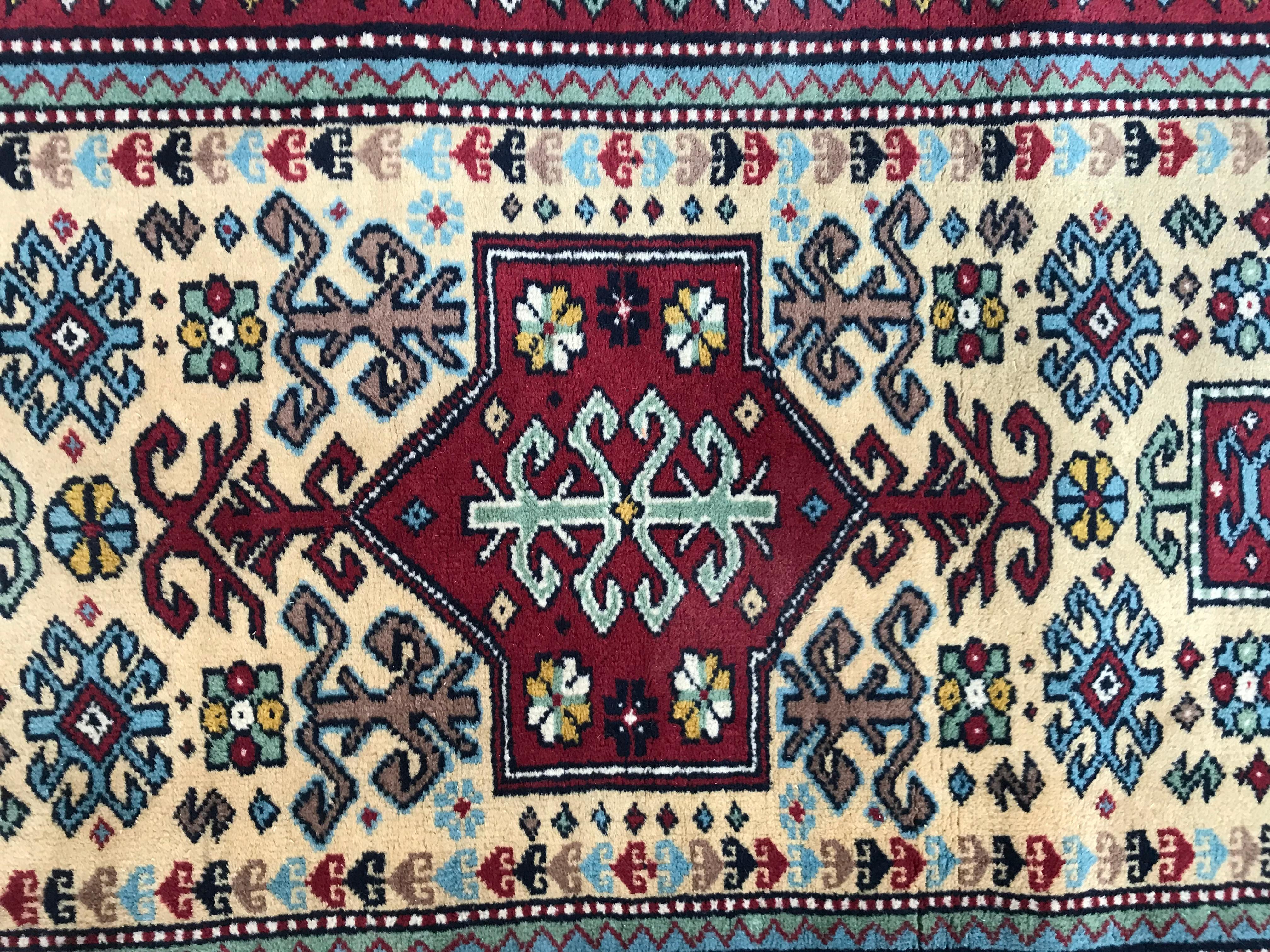 A vintage Shirvan rug late 20th century with geometrical design and nice colors. Entirely hand knotted with wool velvet on cotton foundation.
 