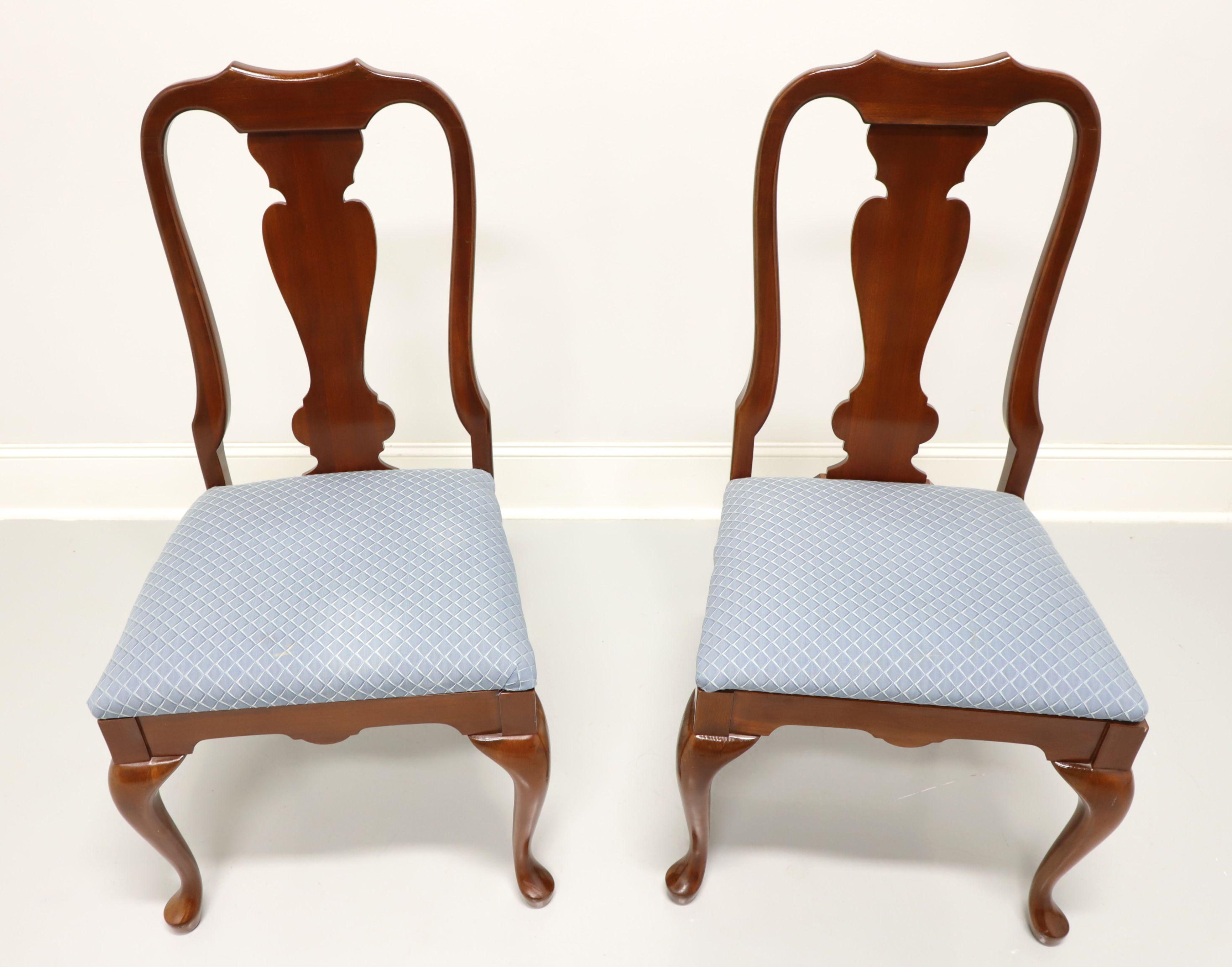 A pair of Queen Anne style dining side chairs, unbranded, similar quality to Hickory chair. Solid cherry with carved crestrail & backs, blue patterned fabric upholstered seats, cabriole legs and pad feet. Made in the USA, in the late 20th