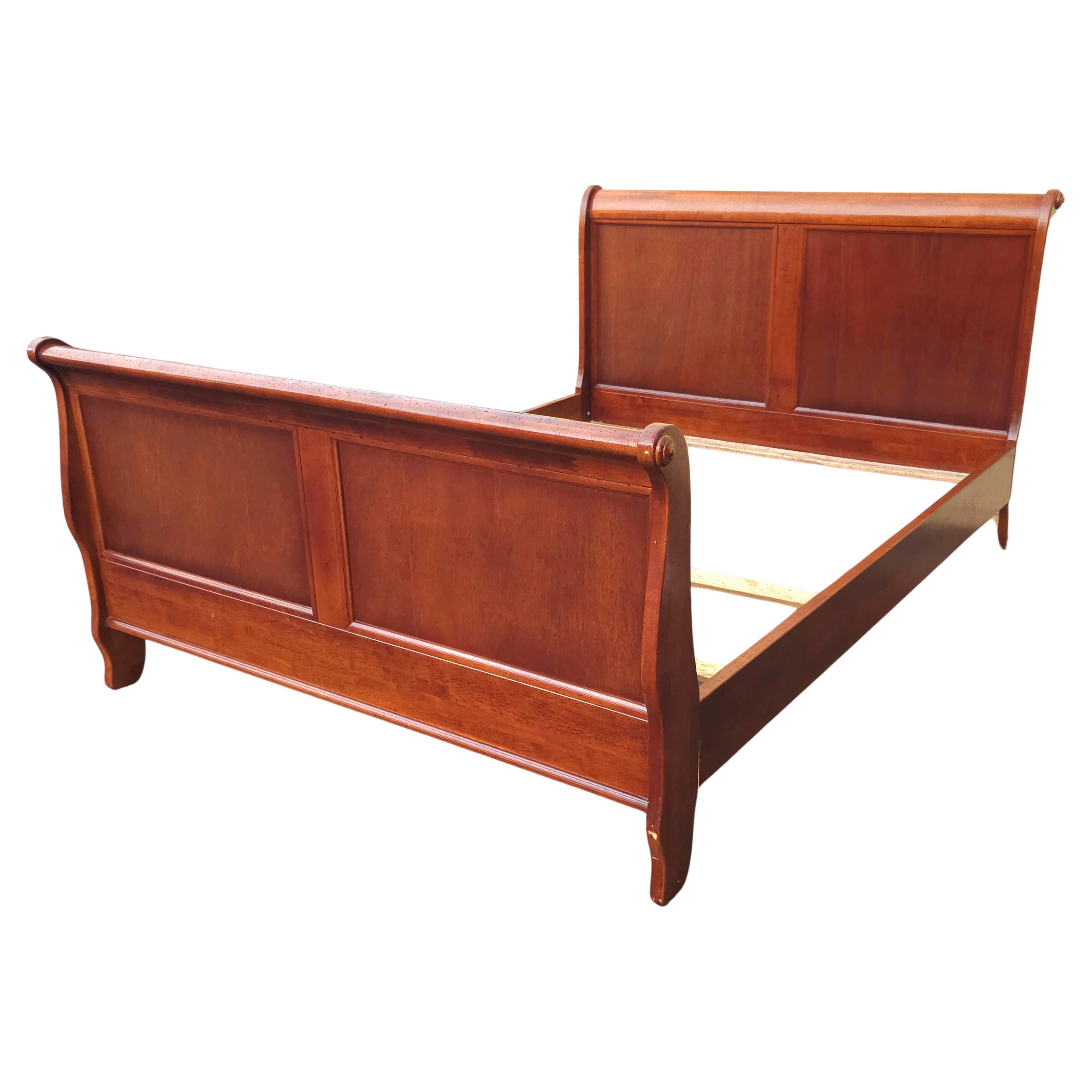 A Late 20th Century Classical Mahogany Queen Size Sleigh Bedstead. Great vintage Condition. Slats present.  Measures 63