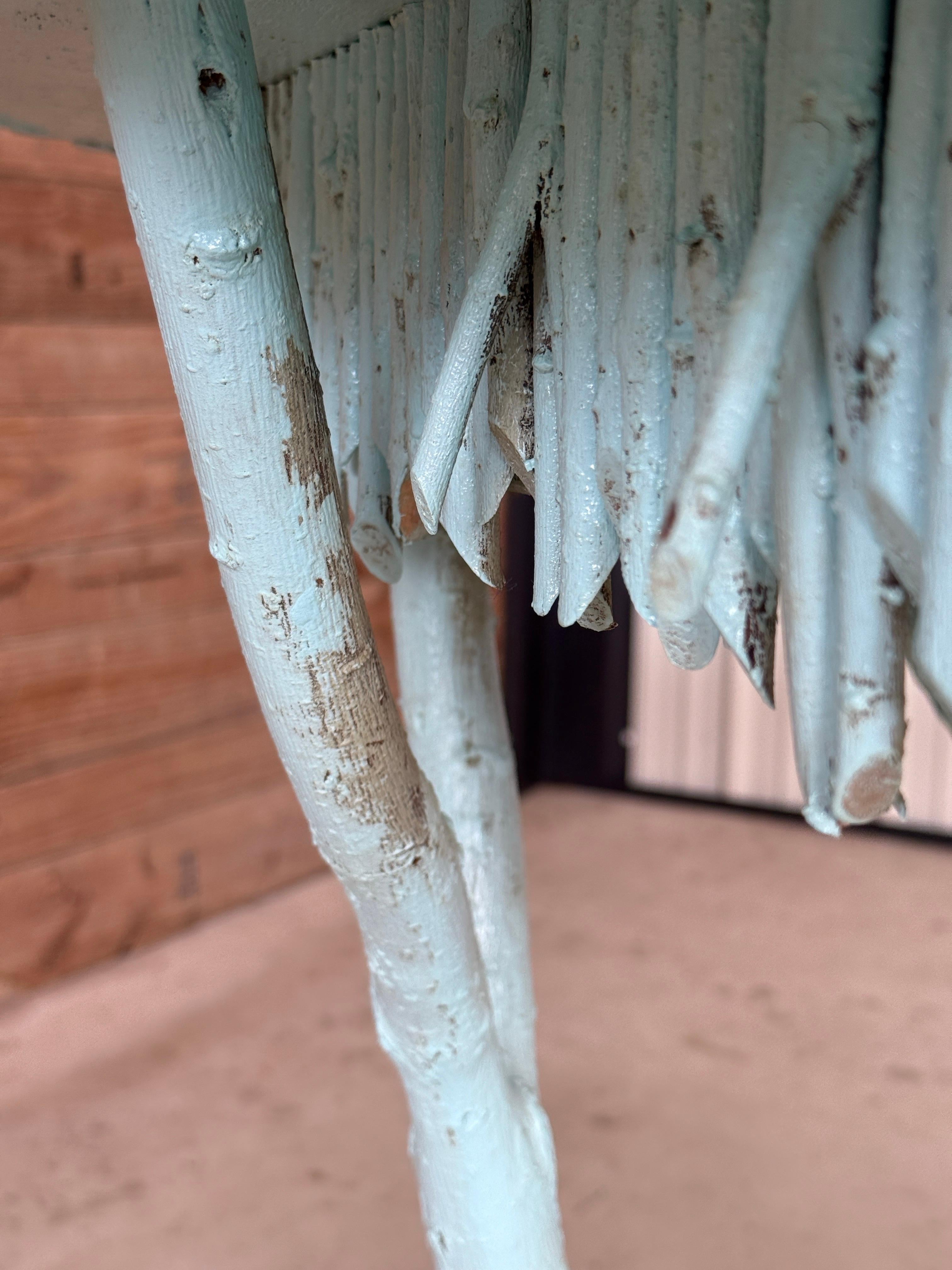 A one-of-a-kind custom-made side and or Center table crafted in the 1990s, featuring an organic driftwood and twig base with branch-like supports.
The sculptural design is accented by a skirt of vertically arranged twigs and a textured wood top with