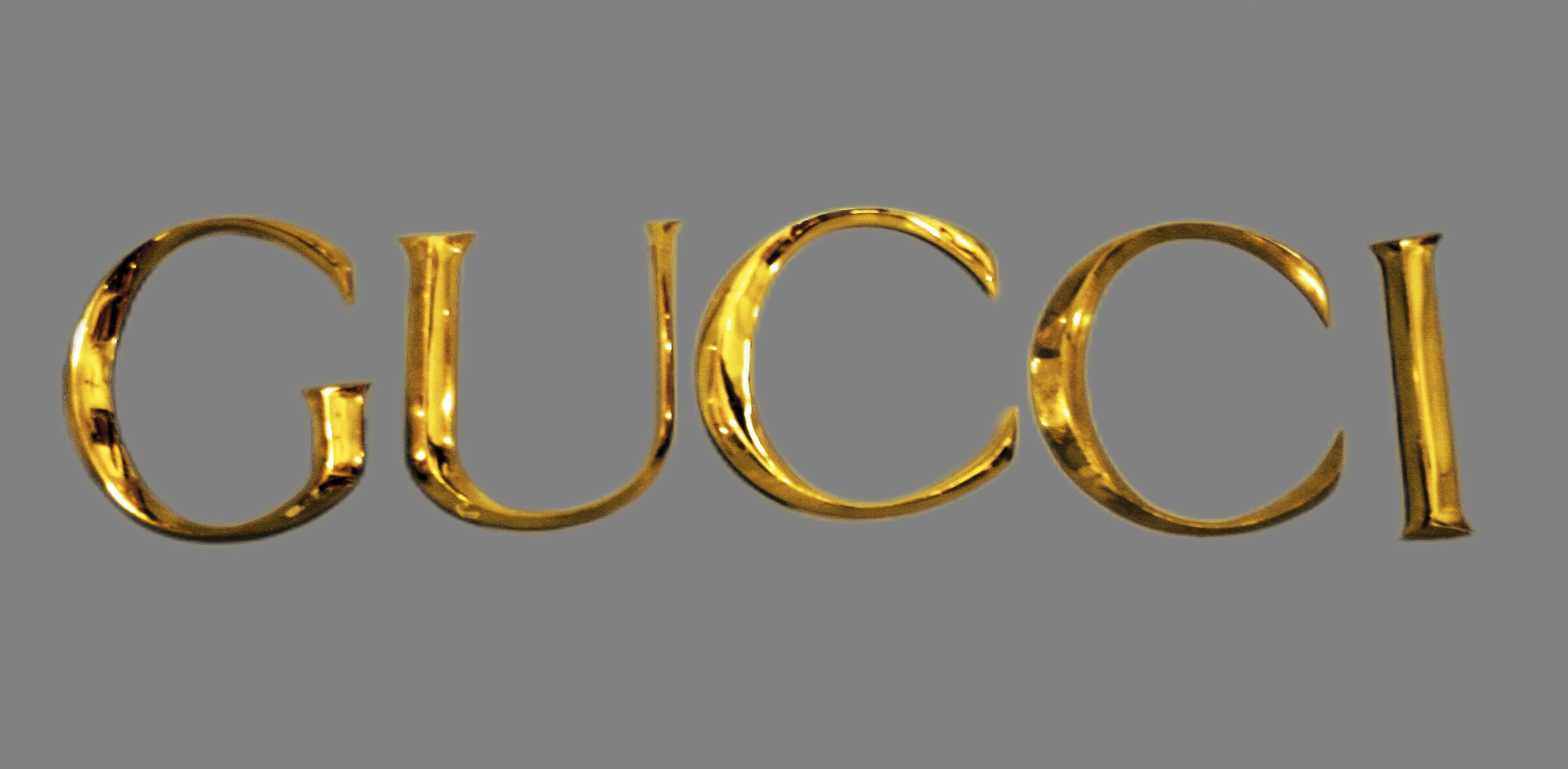 Late 20th century decorative wall ornament Gucci letters made in golden brass from one of their retail store

By: Gucci
Material: brass, copper, metal, zinc
Technique: cast, gilt, molded, polished, metalwork
Dimensions: 1.5 in x 9.5 in x 9.5