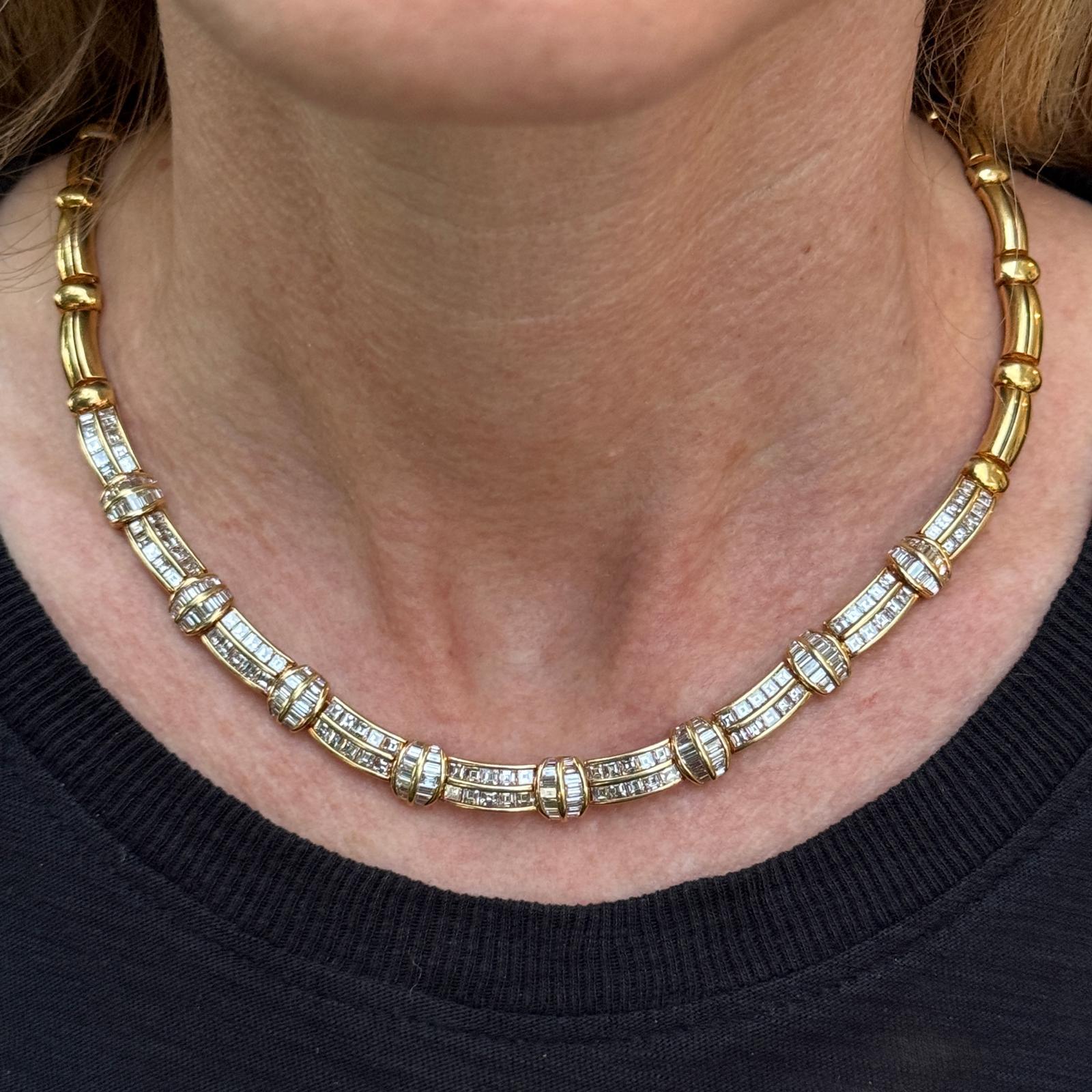 This late 20th-century 18 karat yellow gold ribbed diamond necklace is a striking statement piece, featuring 90 square-cut and 112 baguette-cut diamonds with a total weight of approximately 10.00 carats. The diamonds, graded G-H color and VS