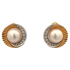 Late 20th Century Diamond & Mabe Pearl 18 Karat Gold Swirl Leverback Earrings