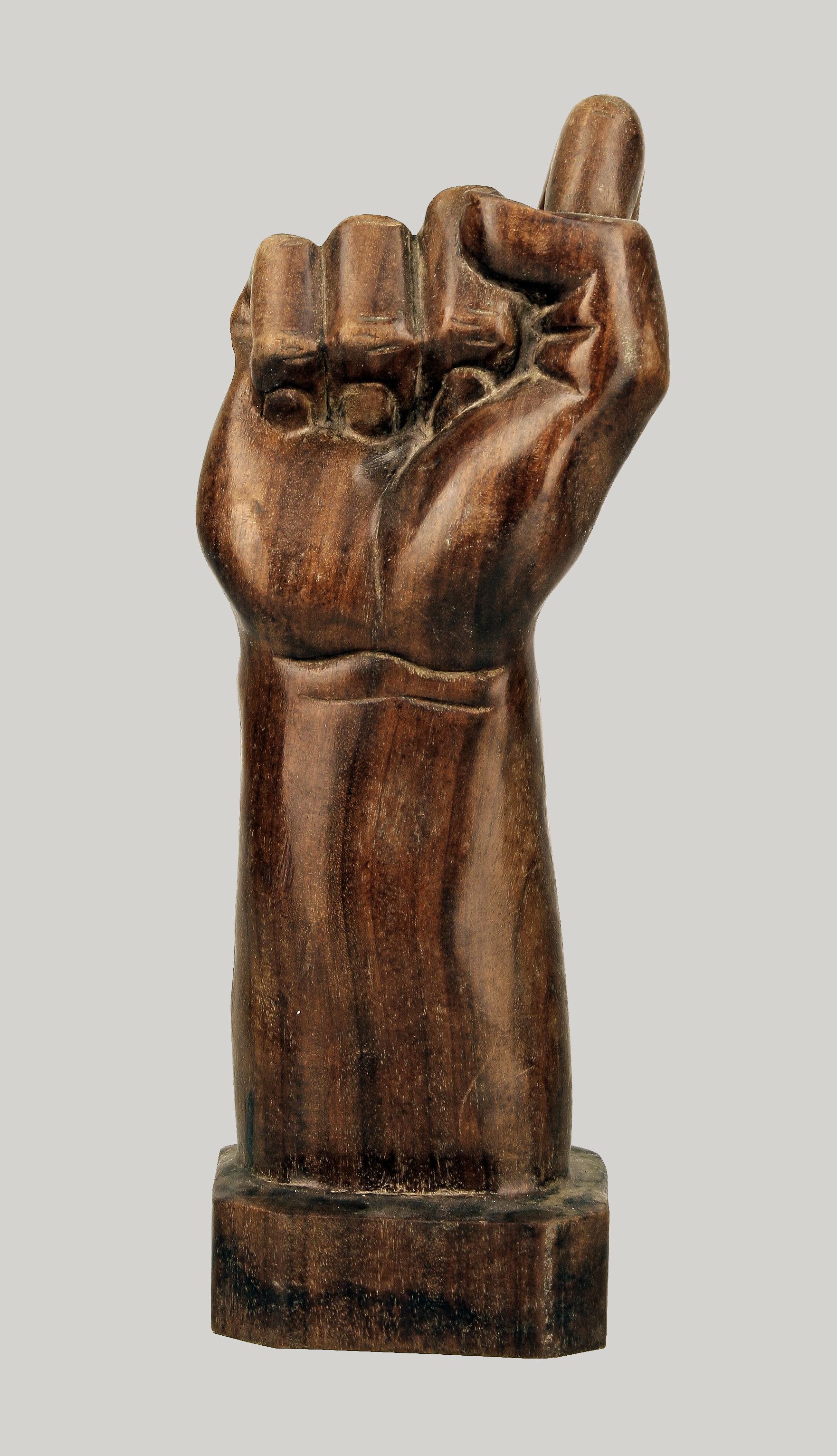 Late 20th century dominican hand-carved varnished wooden hand sculpture/cigar holder

By: unknown
Material: wood
Technique: carved, hand-carved, hand-crafted, varnished
Dimensions: 3.5 in x 3.5 in x 12 in
Date: late 20th century, circa 1990
Style: