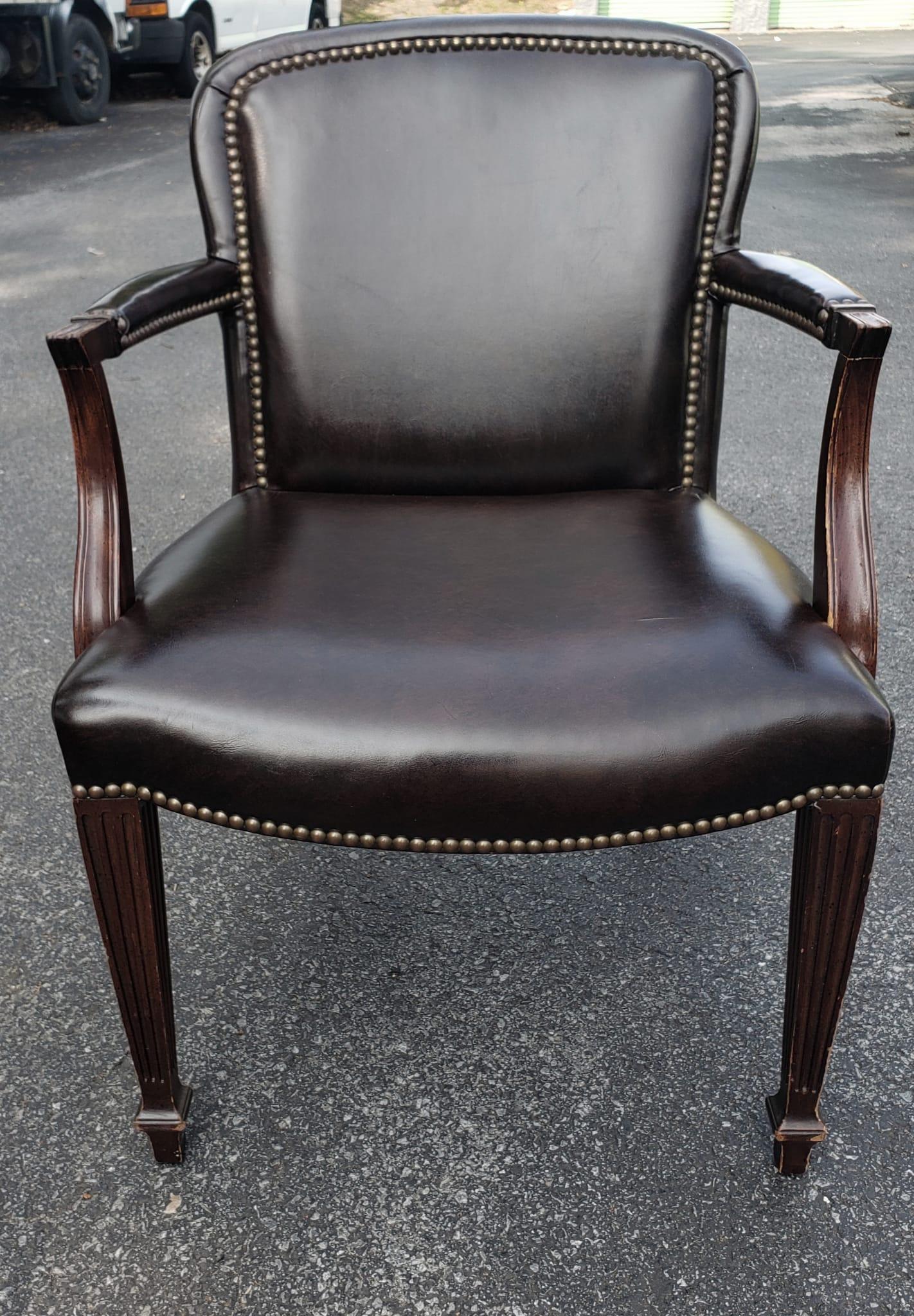 A Late 20th Century PU Leather Office Chair with Nailhead Trims by Drexel.
Measures 22'5