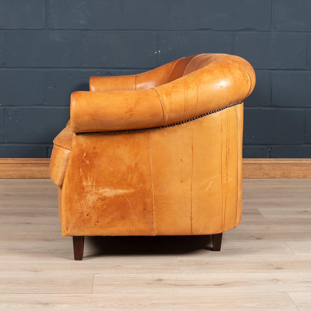 A wonderful leather two /three seater sofa in rich tan sheepskin leather, manufactured in Holland and of the finest quality with great patina. Fantastic look for any interior, both modern and traditional.

  

Condition:

In good condition,