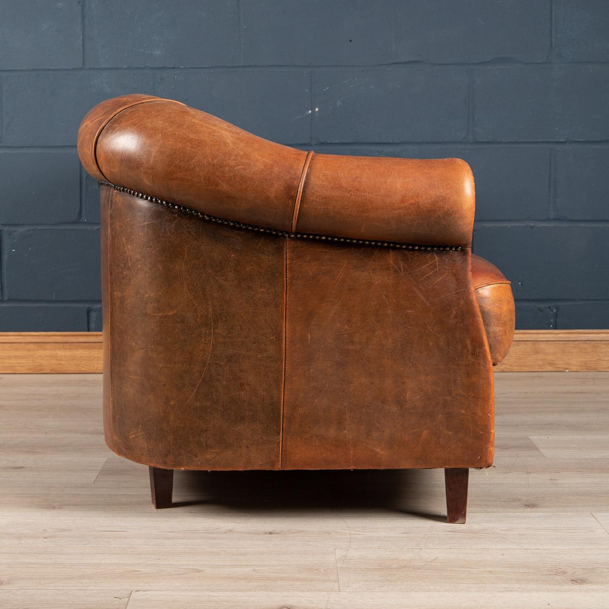 Late 20th Century Dutch Two Seater Tan Sheepskin Leather Sofa In Good Condition In Royal Tunbridge Wells, Kent