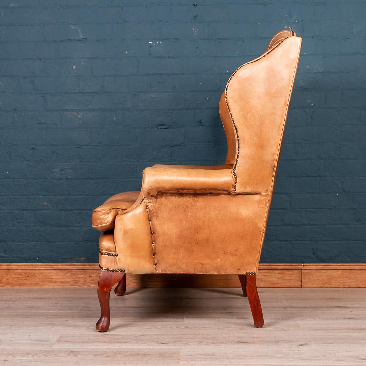 Late 20th Century English Leather Wing Back Chair, circa 1980 In Fair Condition In Royal Tunbridge Wells, Kent