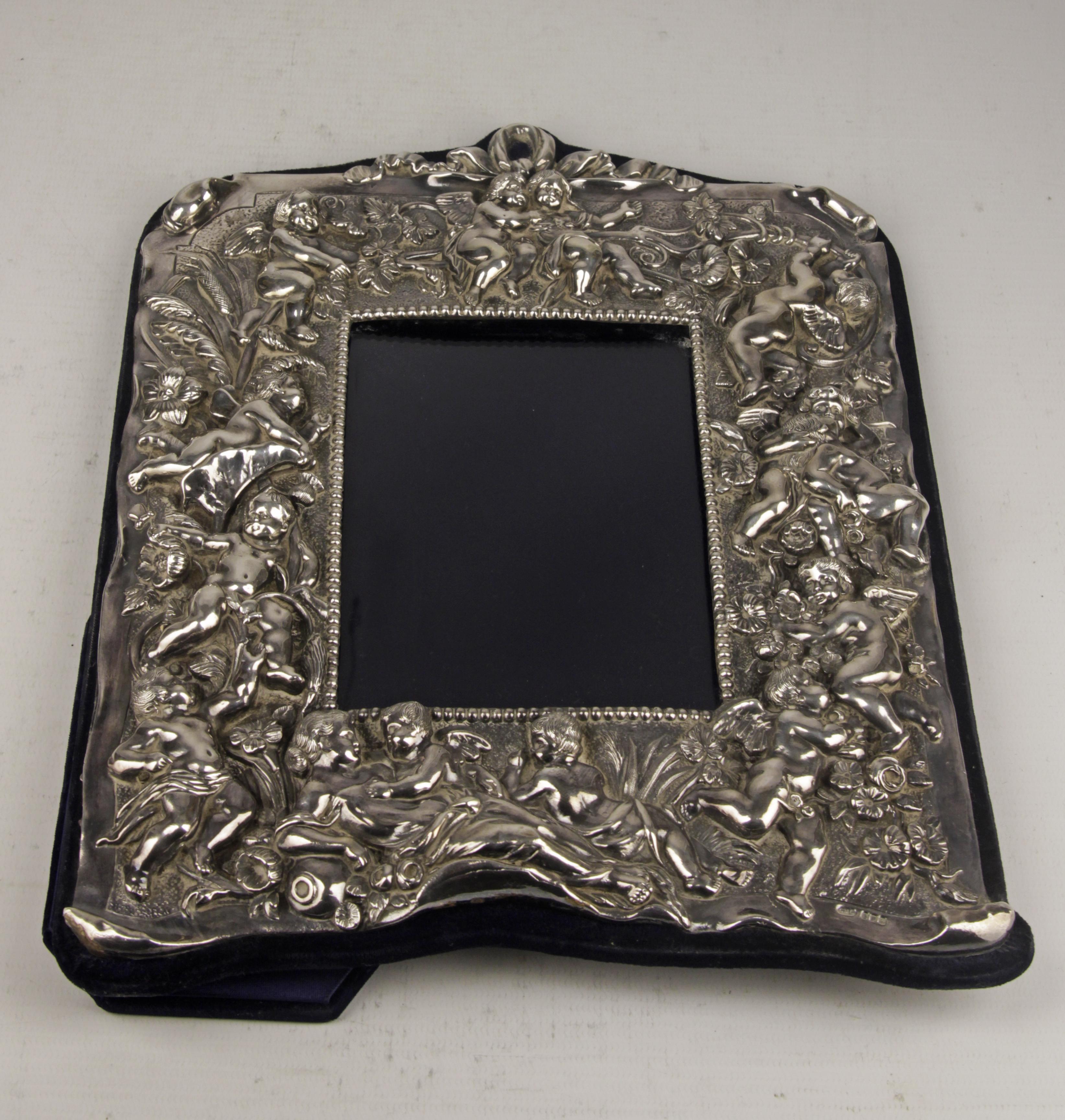 Silver Plate Late 20th Century English Sterling Silver Frame with Cherubs and Plant Motifs
