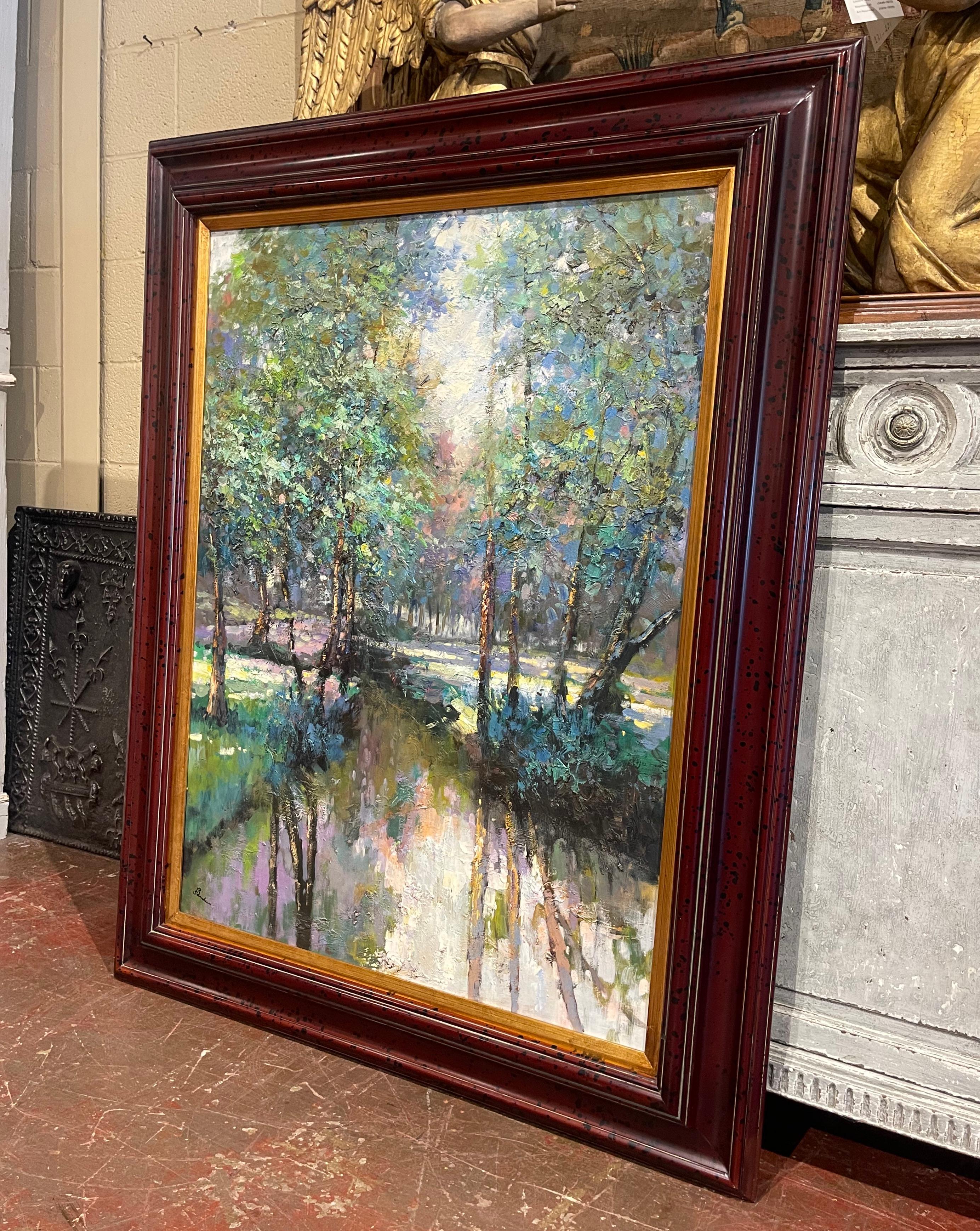 Decorate a living room, study or bedroom with this elegant and colorful landscape painting. Signed by the artist, R. Sanders in the lower left corner, the captivating work of art showcases a vibrant forest, meticulously hand-painted with intricate