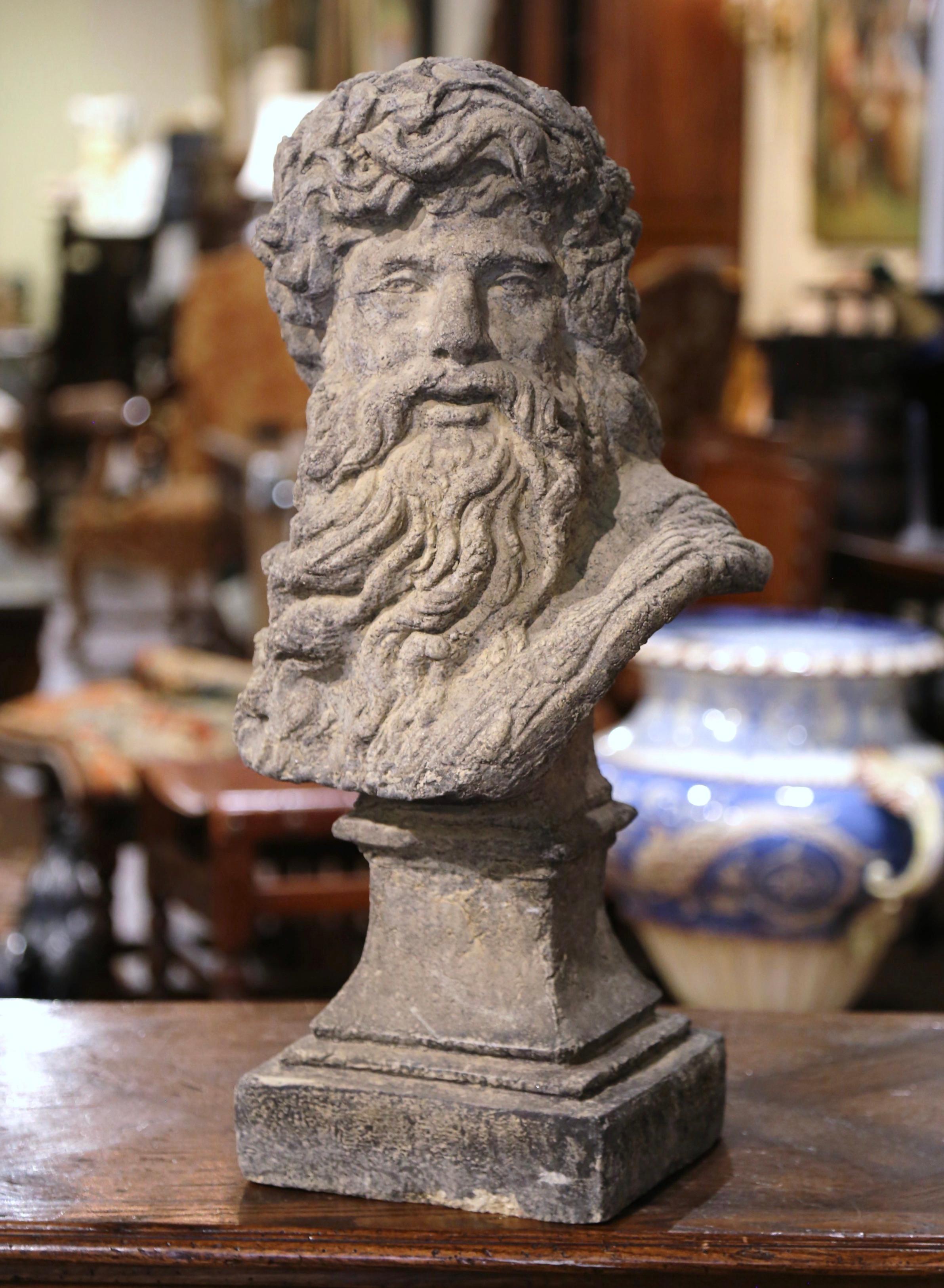 Decorate a garden or patio with this elegant antique outdoor statue of Zeus. Carved of stone in France circa 1970, the large figure depicts the Greek god Zeus, bearded head turned to the side. The tall statuary sculpture is in excellent condition
