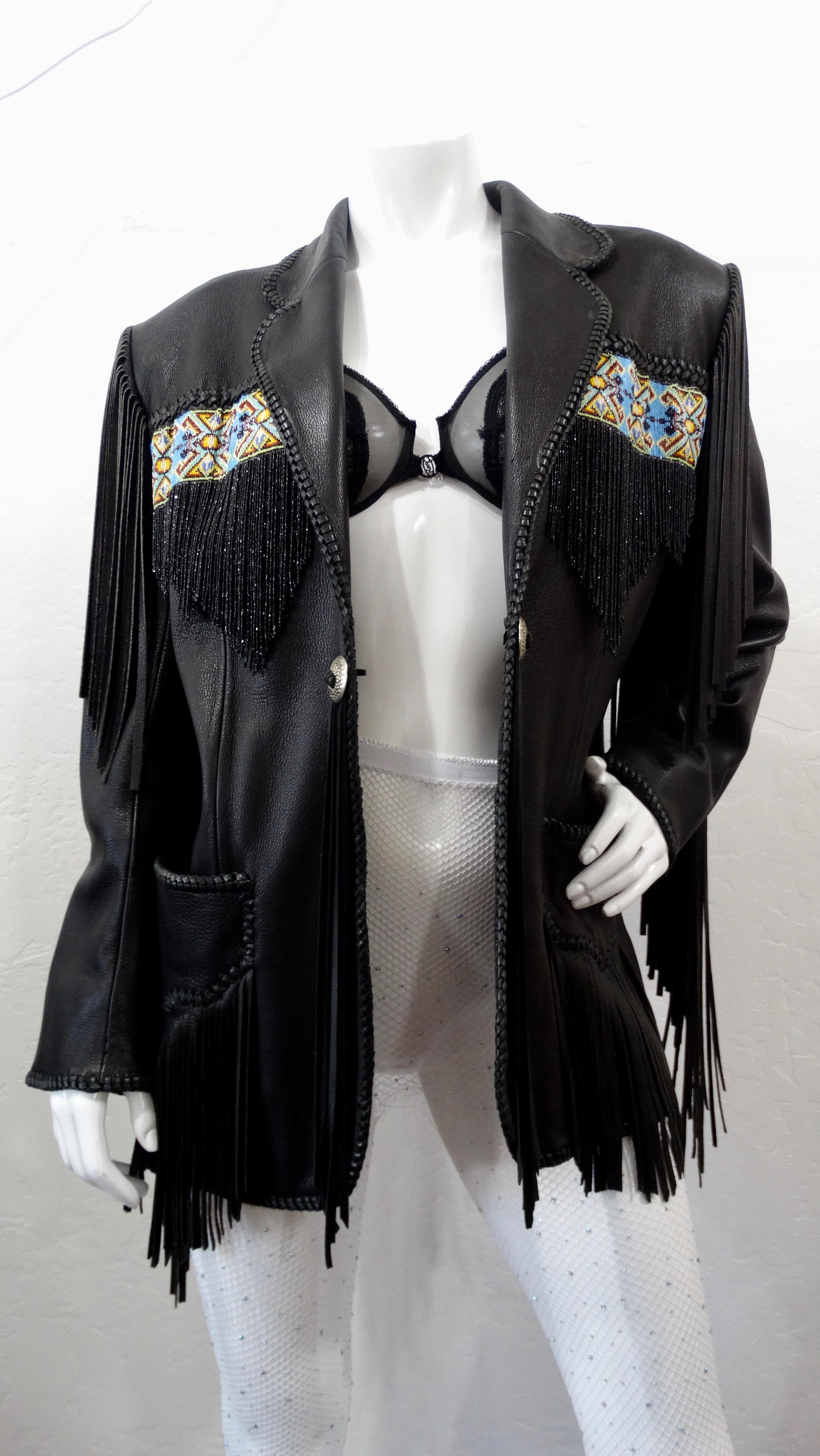 All eyes on you when wearing this amazing vintage leather jacket! Circa late 20th century from Chic Skins of California, this soft black leather jacket features leather and black beaded fringe, two front pockets, exposed leather basket weave