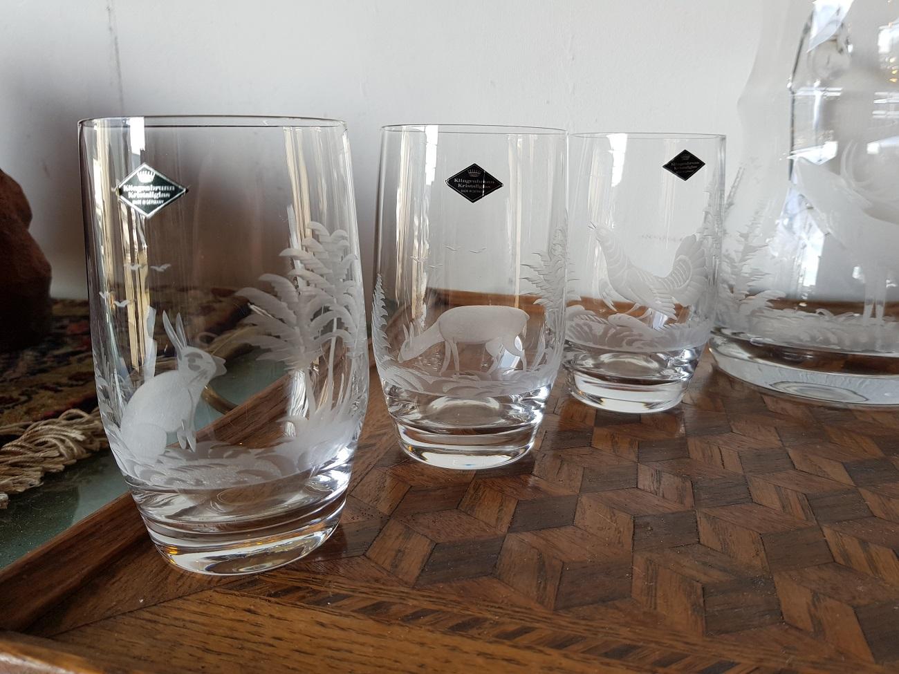 Fabulous German crystal water jug set with six glasses and all are engraved with representations of various animals and all in mint condition, late 20th century.

The measurements of the jug is:
Depth 11 cm/ 4.3 inch.
Width 11 cm/ 4.3