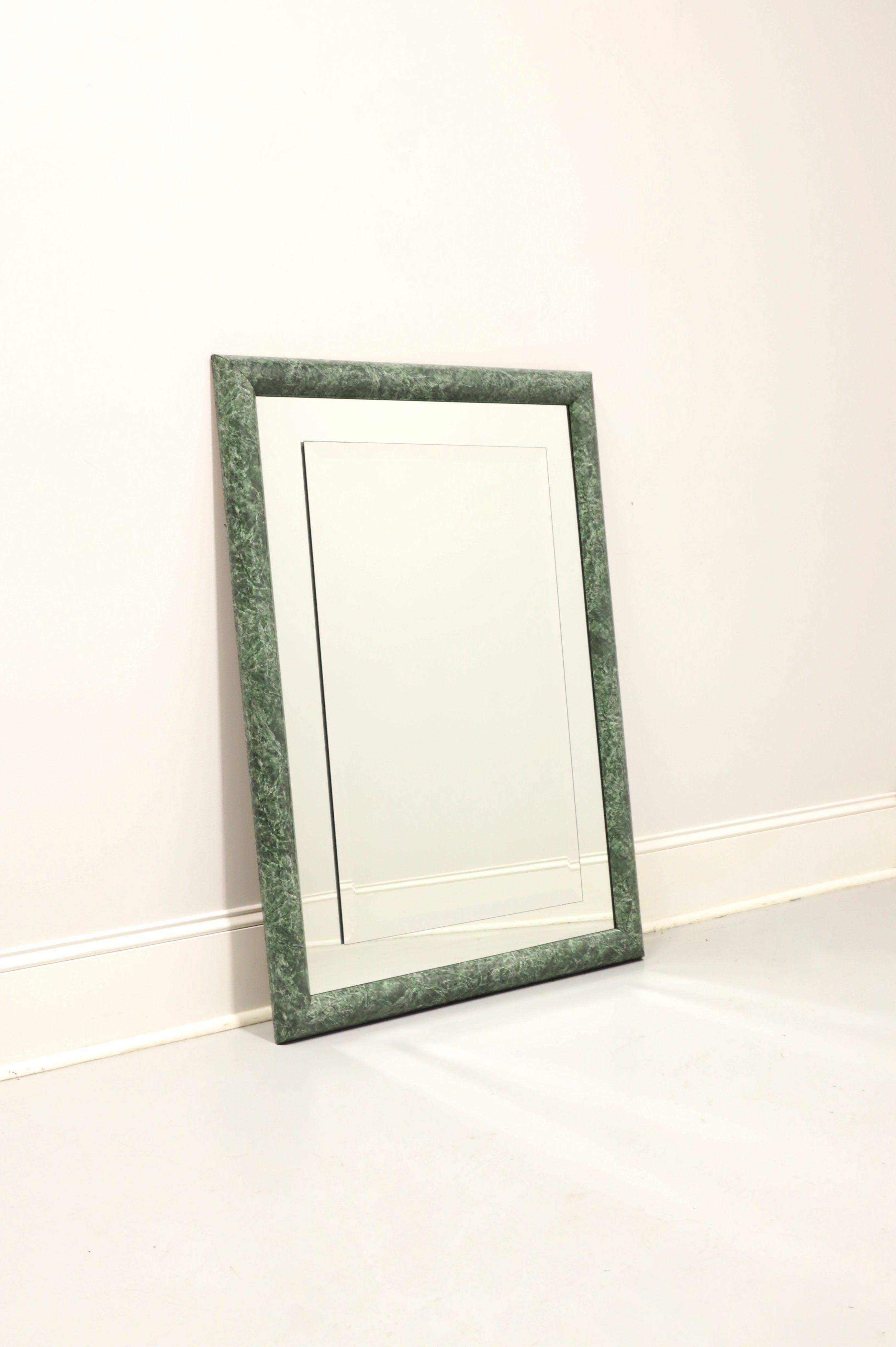 A Contemporary style wall mirror, unbranded, similar quality to Carolina Mirror. Beveled mirror glass with a matte of mirror glass and in a green faux marble (laminate over wood) frame. Made in the USA, in the late 20th century. 

Measures: 30.5w
