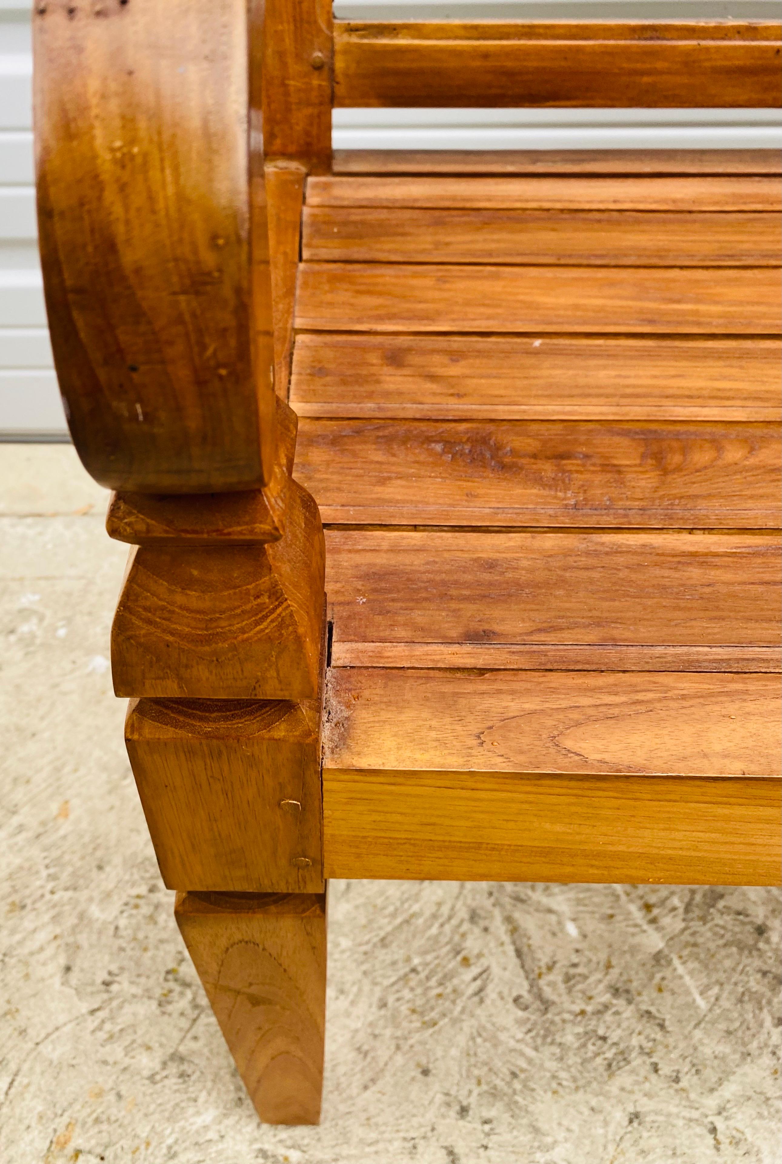 Anglo Raj Late 20th century hand carved teak decorator bench. For Sale