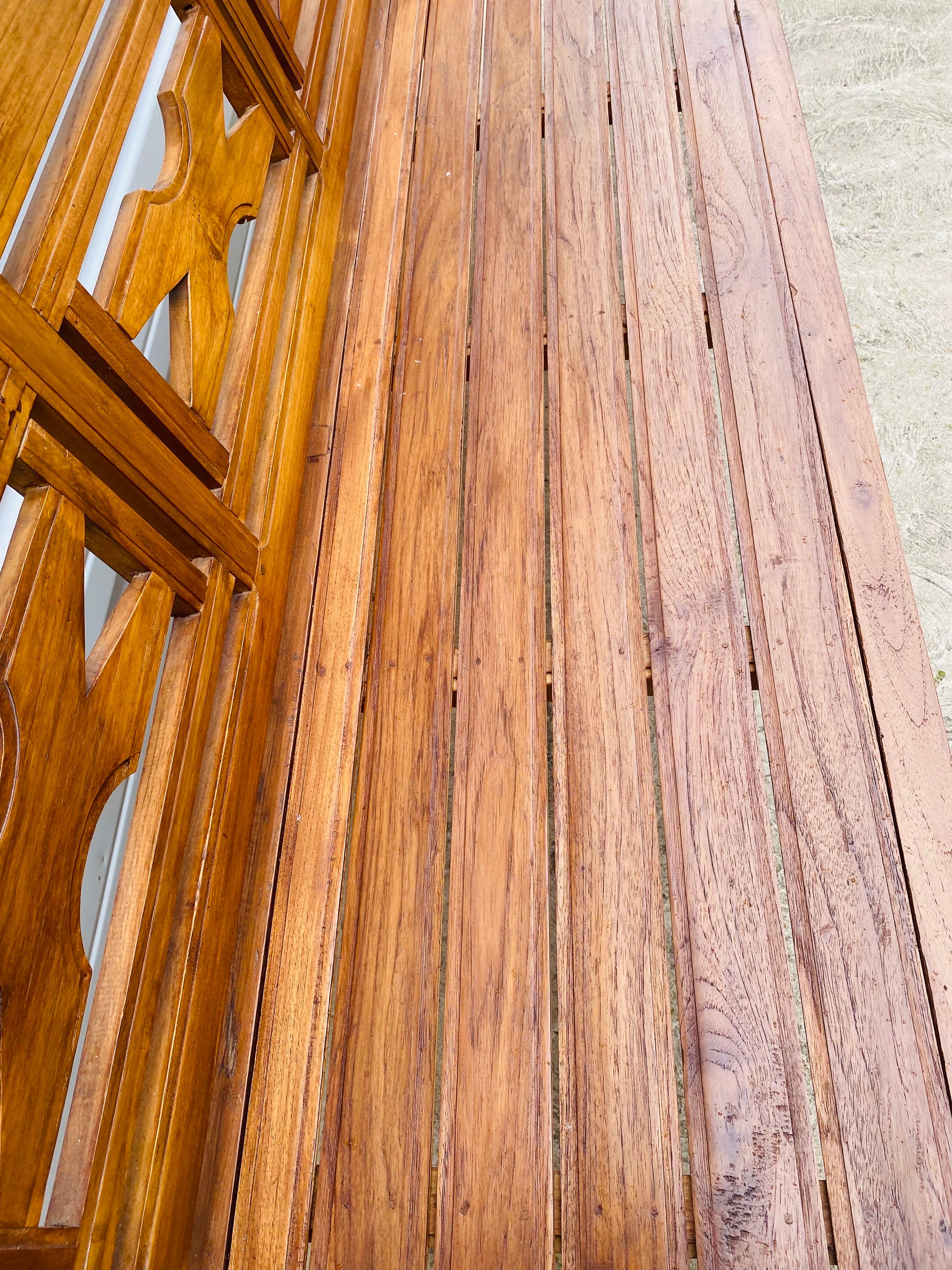 Hand-Crafted Late 20th century hand carved teak decorator bench. For Sale