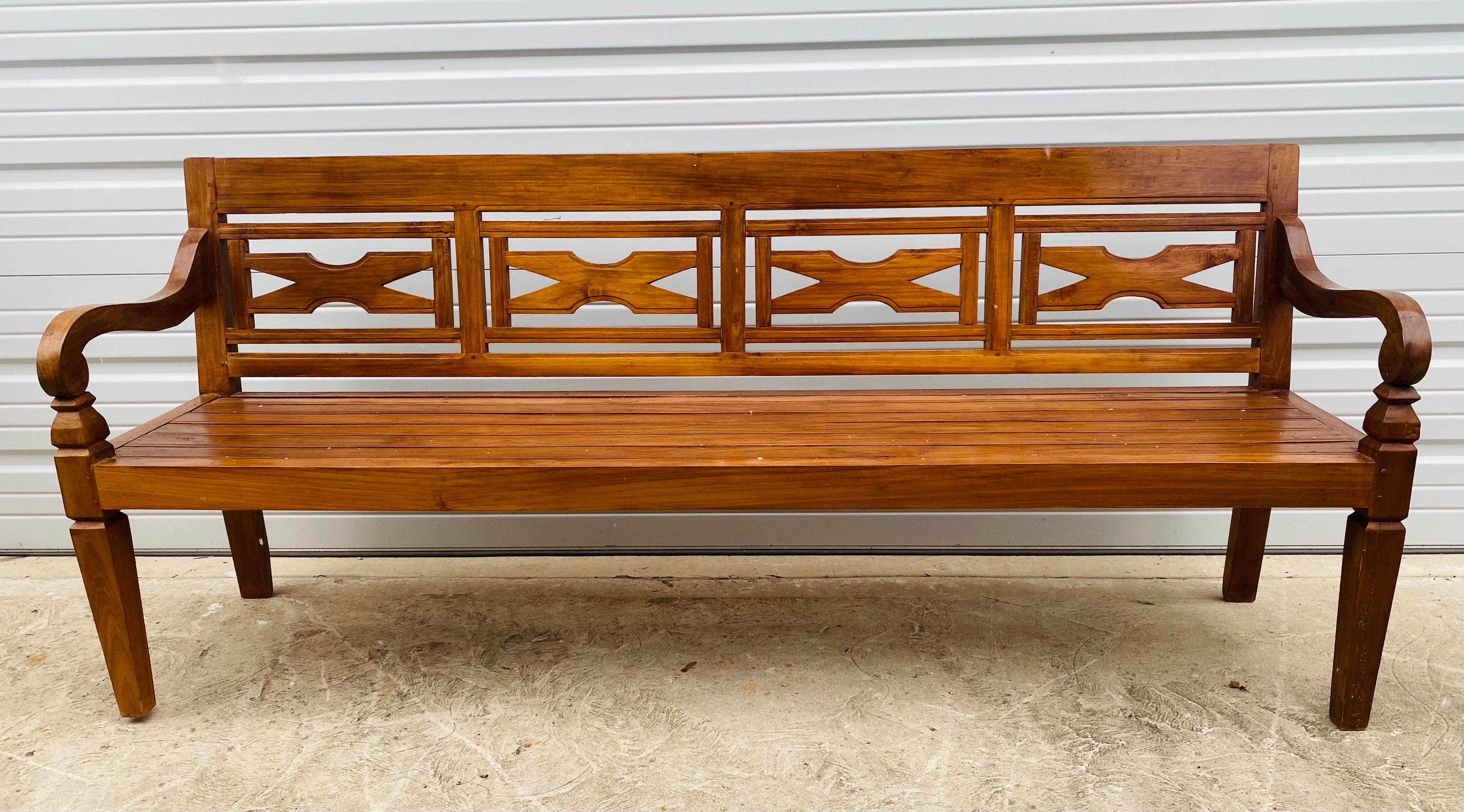 Late 20th century hand carved teak decorator bench. For Sale 1