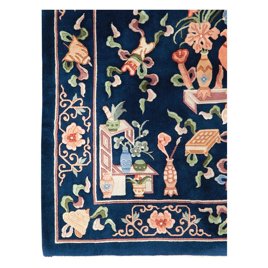 A vintage Chinese square accent rug in dark blue handmade during the late 20th century.