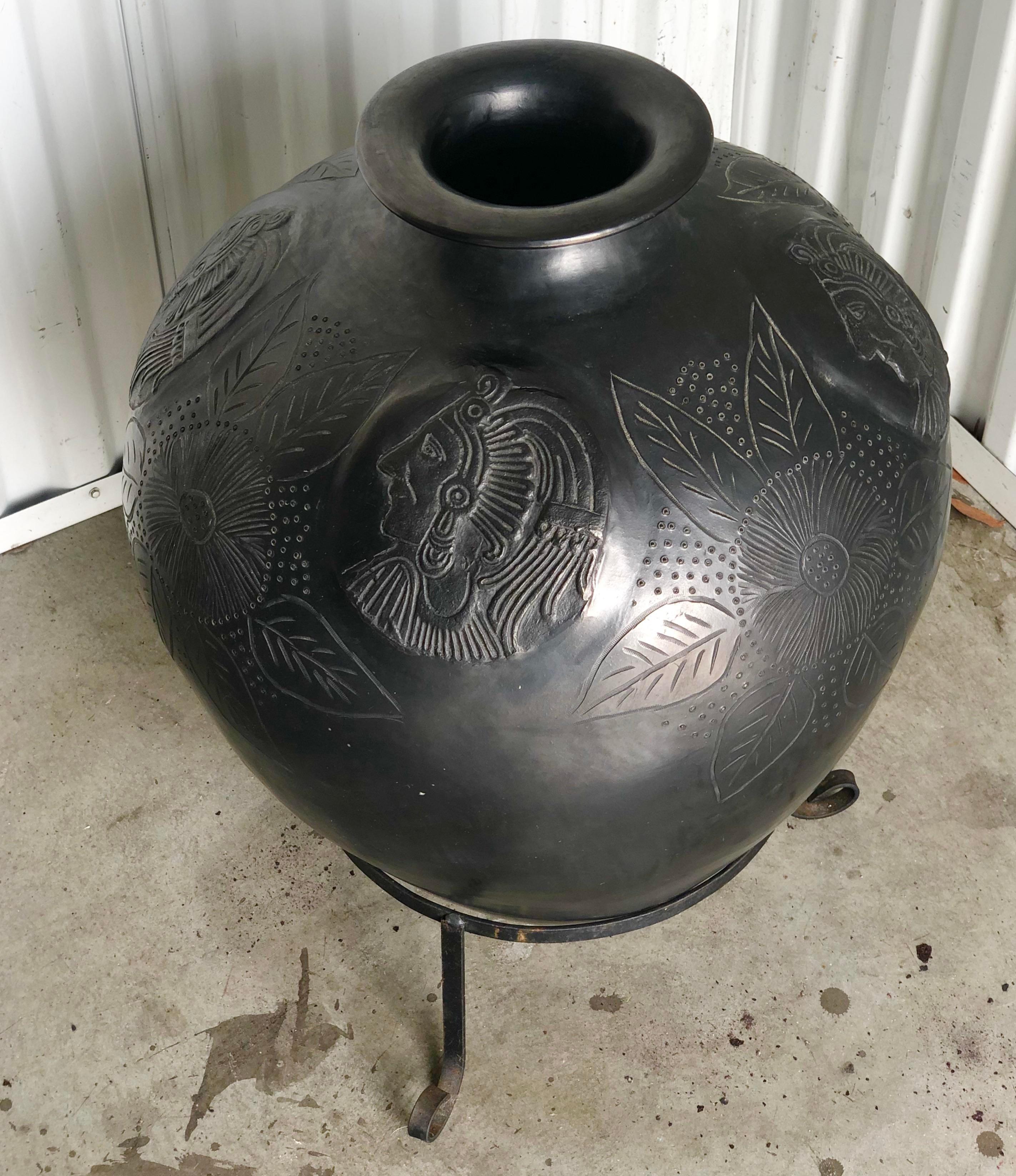 Bohemian Late 20th Century Indian Head Black on Black Pottery Urn For Sale