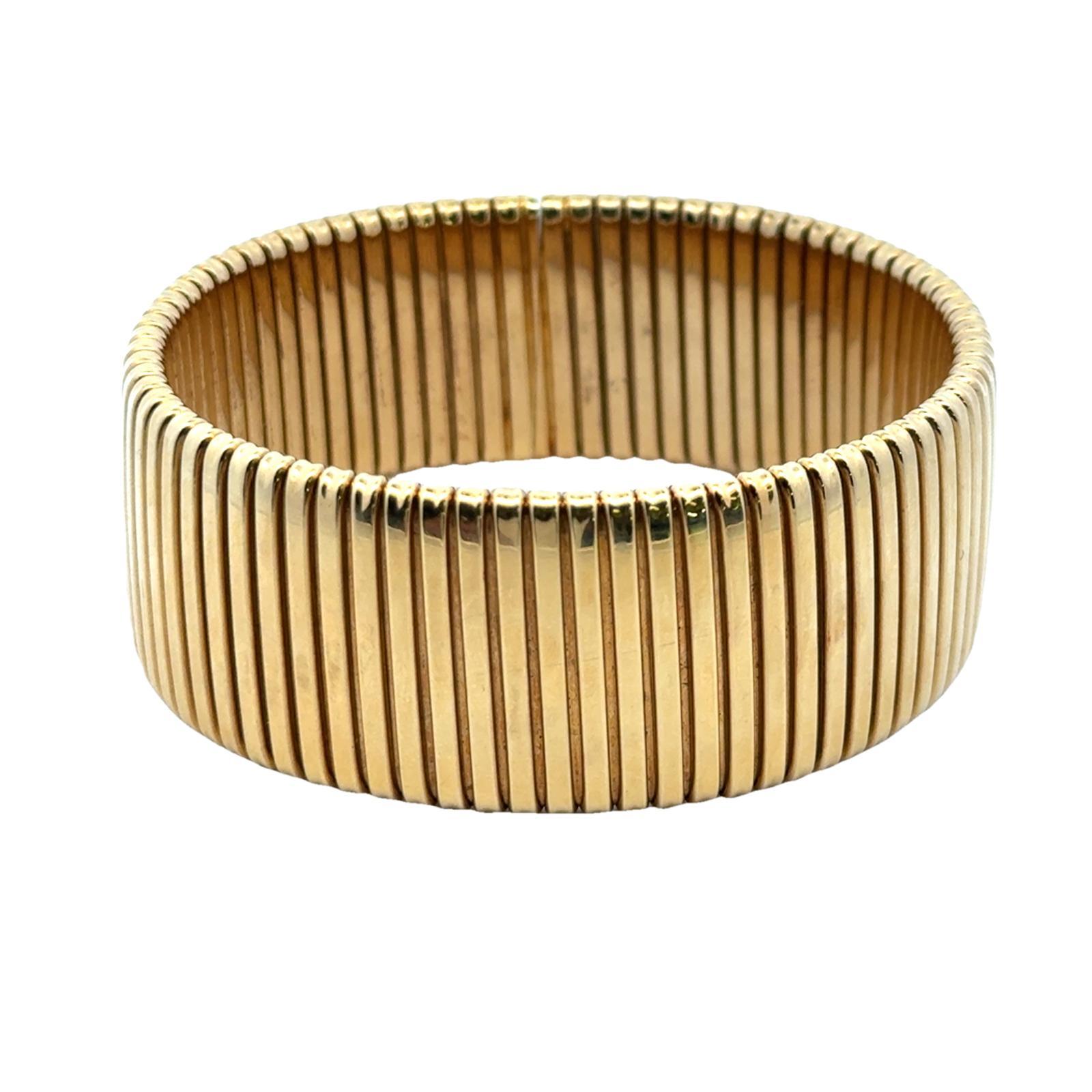 Late 20th Century Italian 18 Karat Yellow Gold Wide Flexible Tubegas Bracelet 1