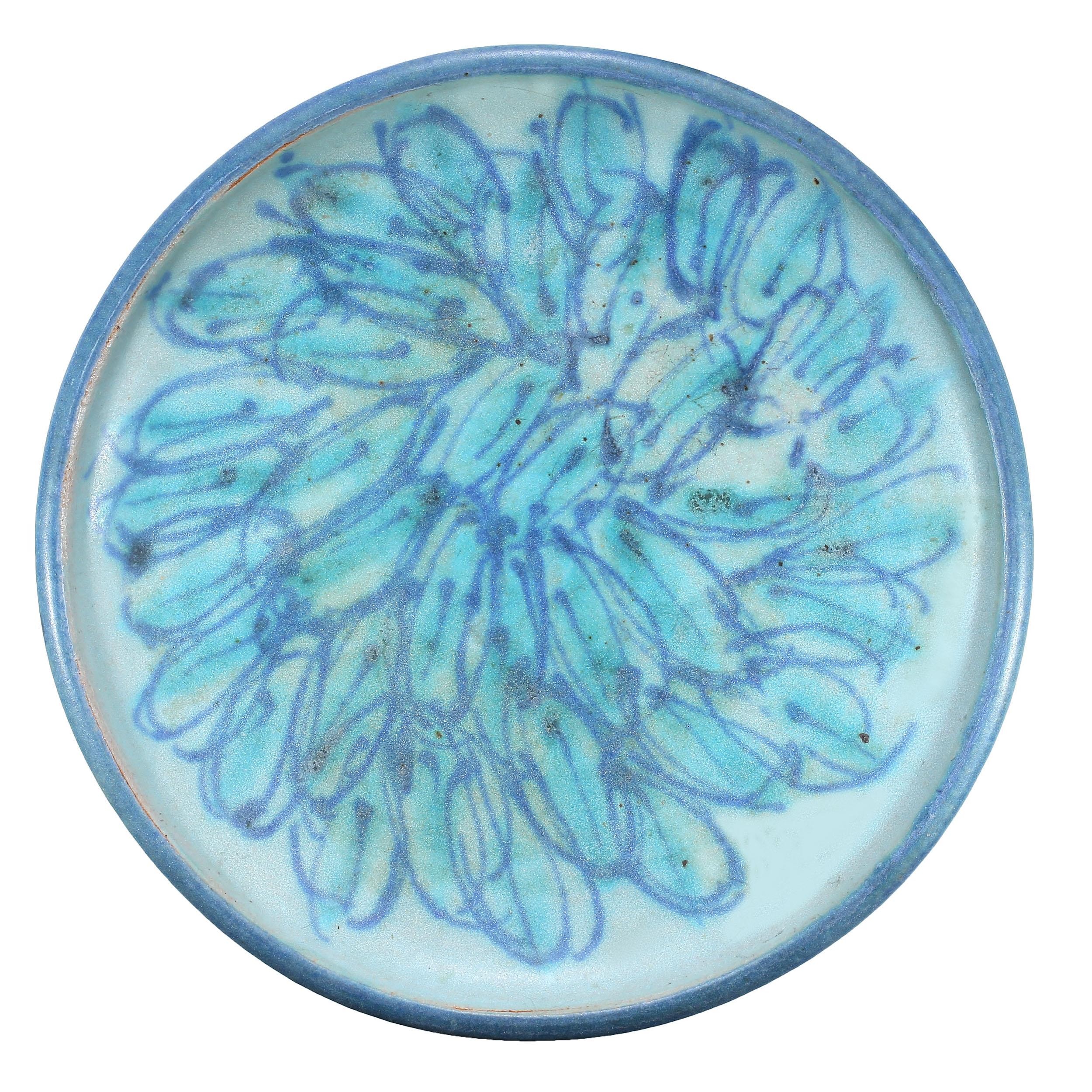 J.T. Abernathy Iconic Blue Glaze Plate

This stunning J.T. Abernathy plate exemplifies midcentury modern artistry with its iconic blue glaze and timeless design. Crafted with precision and signed by the artist, it is both a functional piece and a