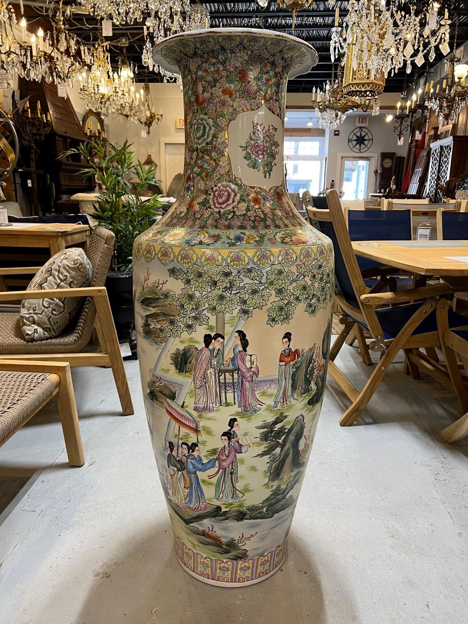 Late 20th Century tall Chinese porcelain palace urn hand painted. Various palace scenes and figures on all sides with beautiful colors and details. This large palace urn came from a Greenwich CT. estate and would look amazing in any room. No cracks