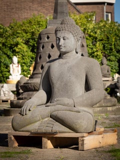 Late 20th century large lavastone Buddha statue in Bhumisparsha Mudra