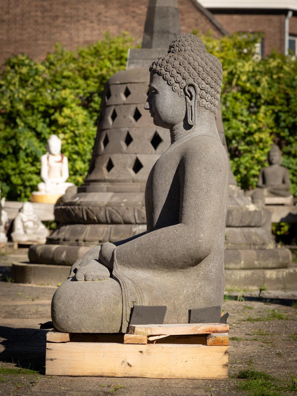 Indonesian Late 20th century large lavastone Buddha statue in Bhumisparsha Mudra For Sale