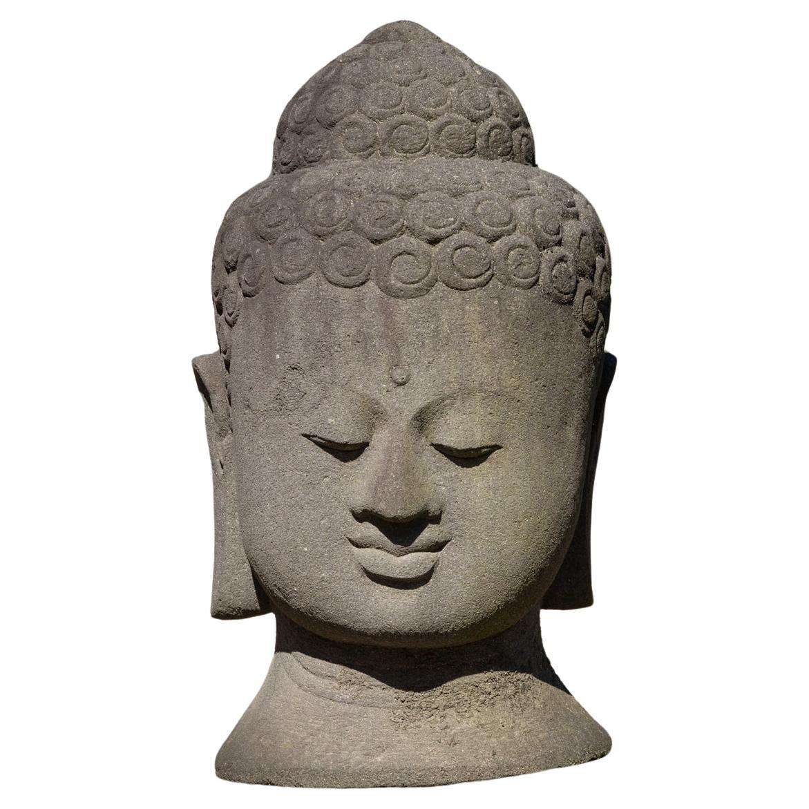 Late 20th century large old lavastone Buddha head from Indonesia For Sale