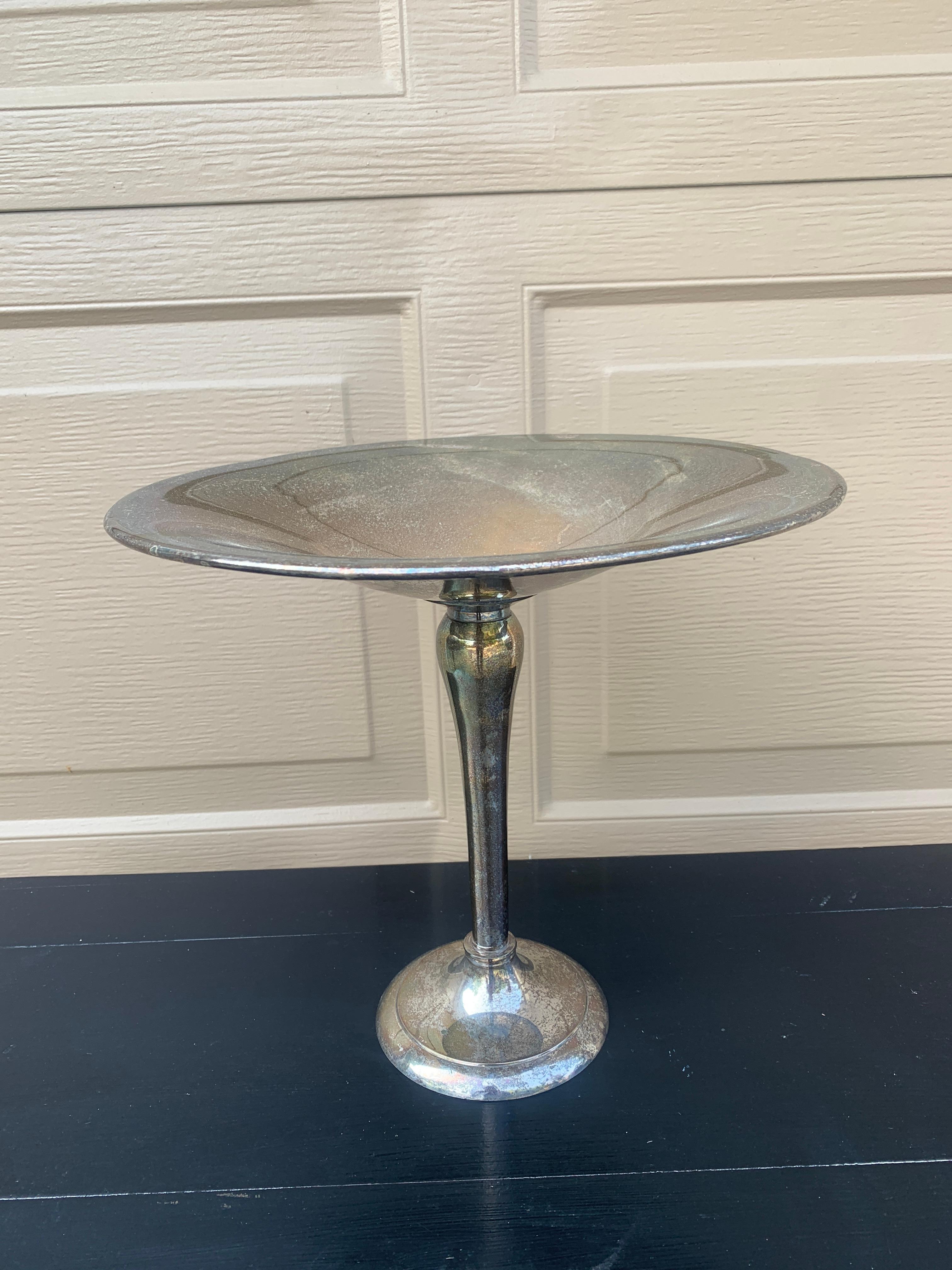A gorgeous large silver plate compote

USA, Late 20th Century

Measures: 11.75