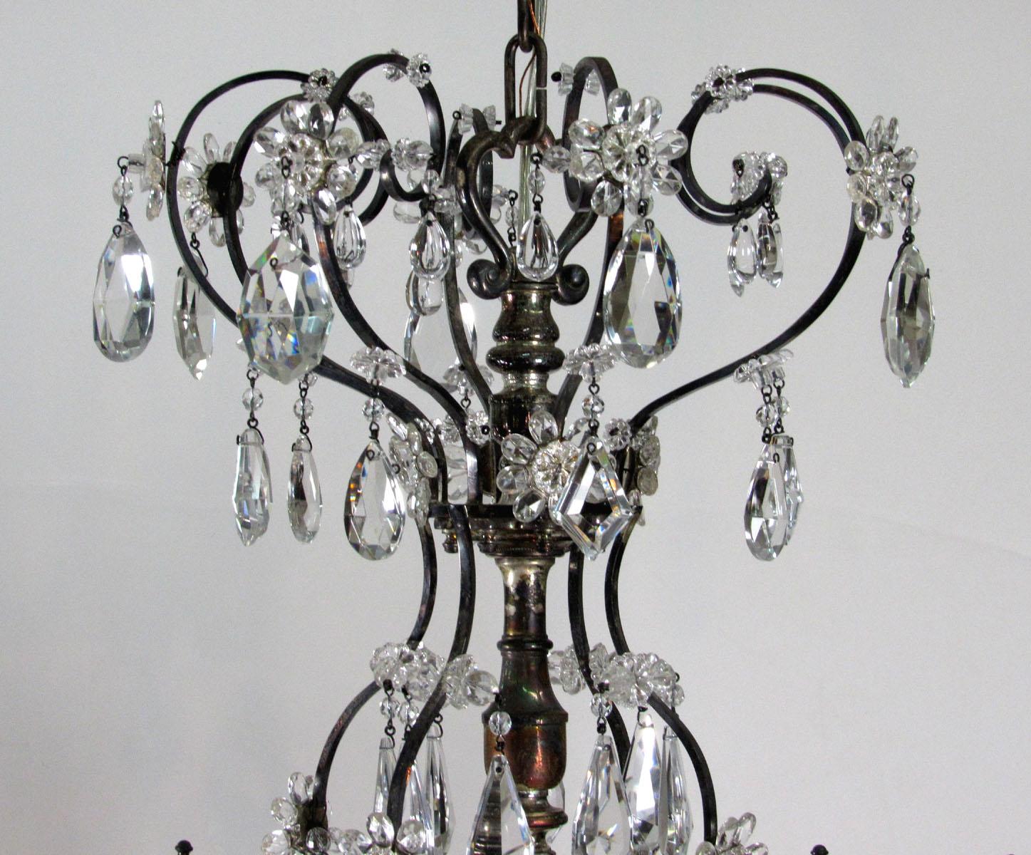 Late 20th Century Louis XV style silvered bronze and crystal eight-light chandelier with beading and faceted crystals, crafted in Milan.