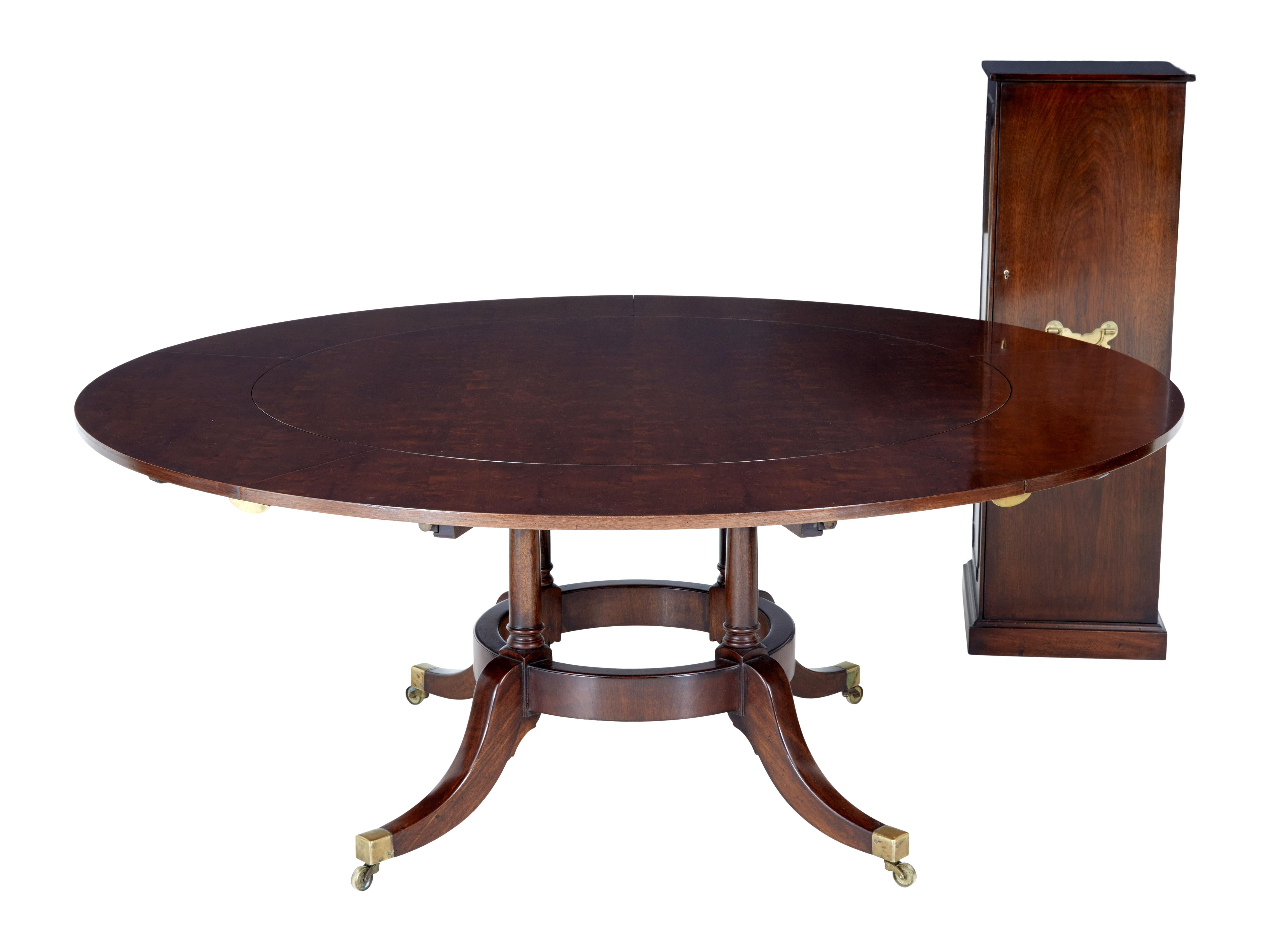 Late 20th century mahogany jupe dining table with leaf cabinet circa 1990.

Here we offer a beautiful jupe dining table made in mahogany. These tables allow themselves to be extended by adding to the diameter for increased seating.

Circular top