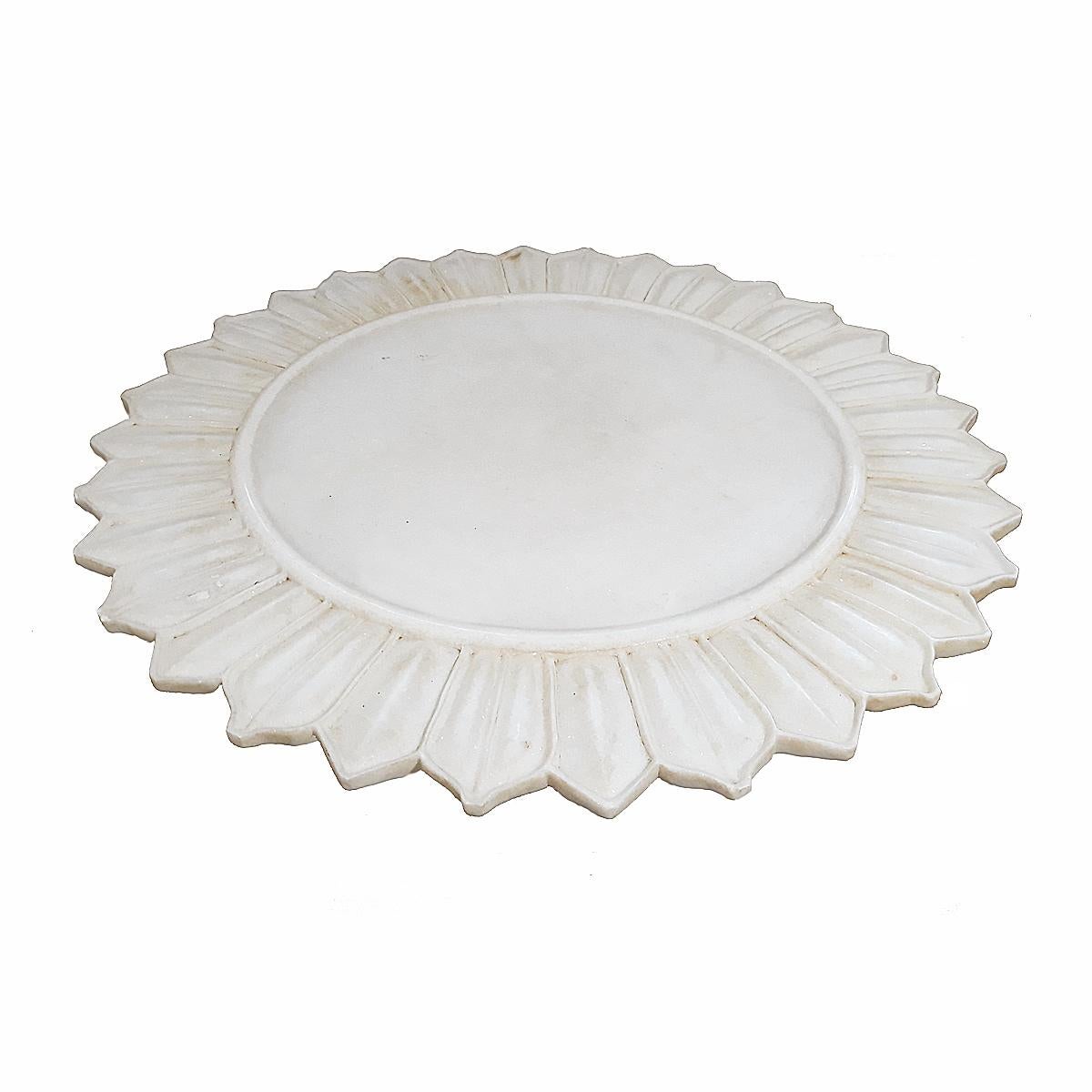 A hand-carved marble platter, server or charger from India.