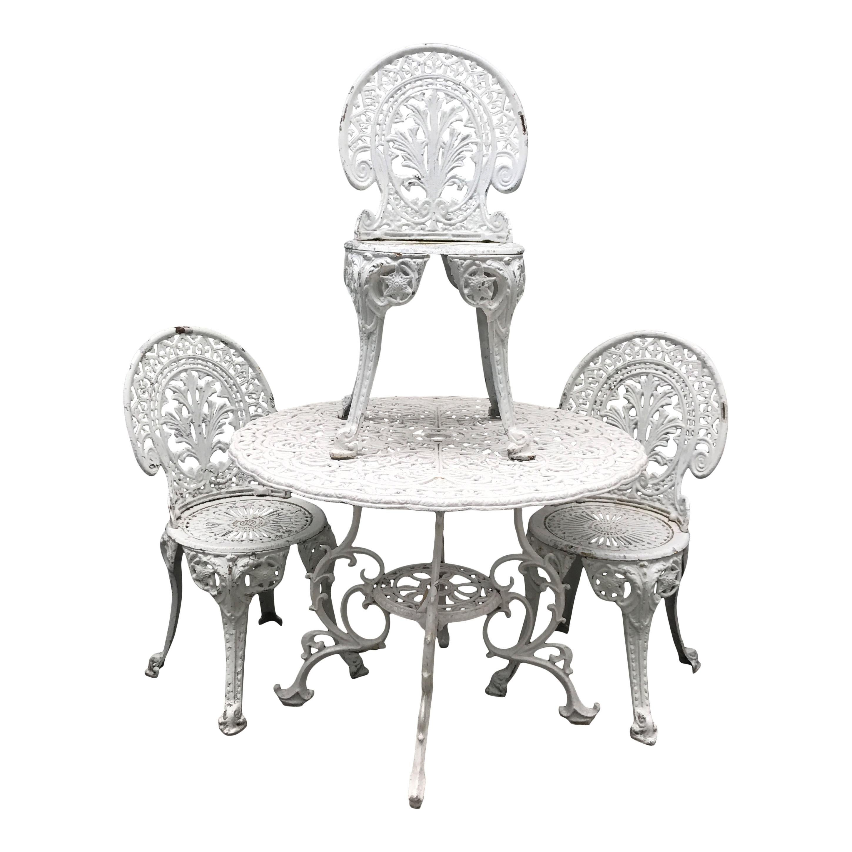 European Late 20th Century Metal Garden Table with Cast Iron Chairs