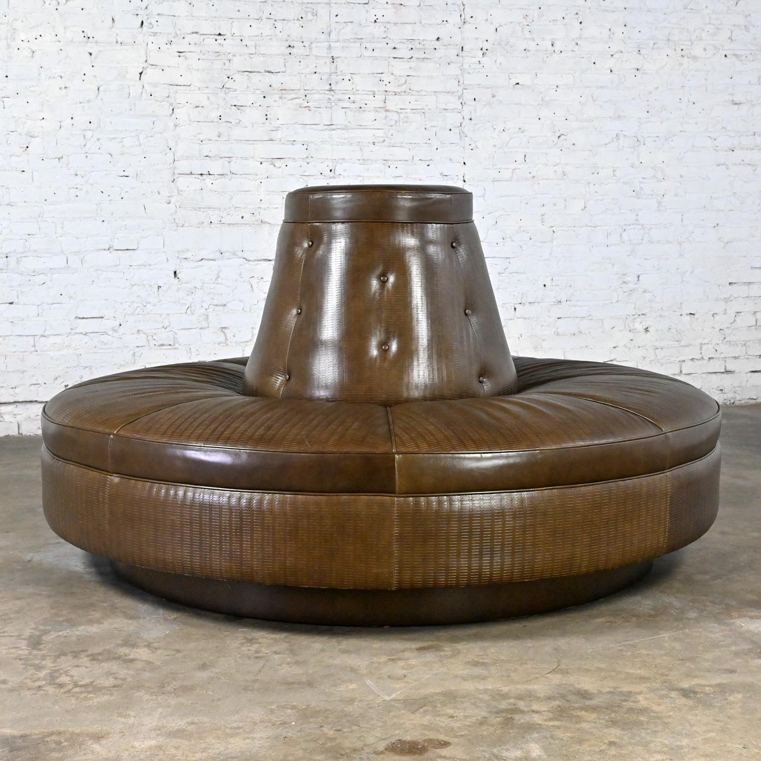 Awesome vintage Modern round or circular banquet sofa or settee custom made with brown smooth & textured leather and button detail. Beautiful condition, keeping in mind that this is vintage and not new so will have signs of use and wear. Some small