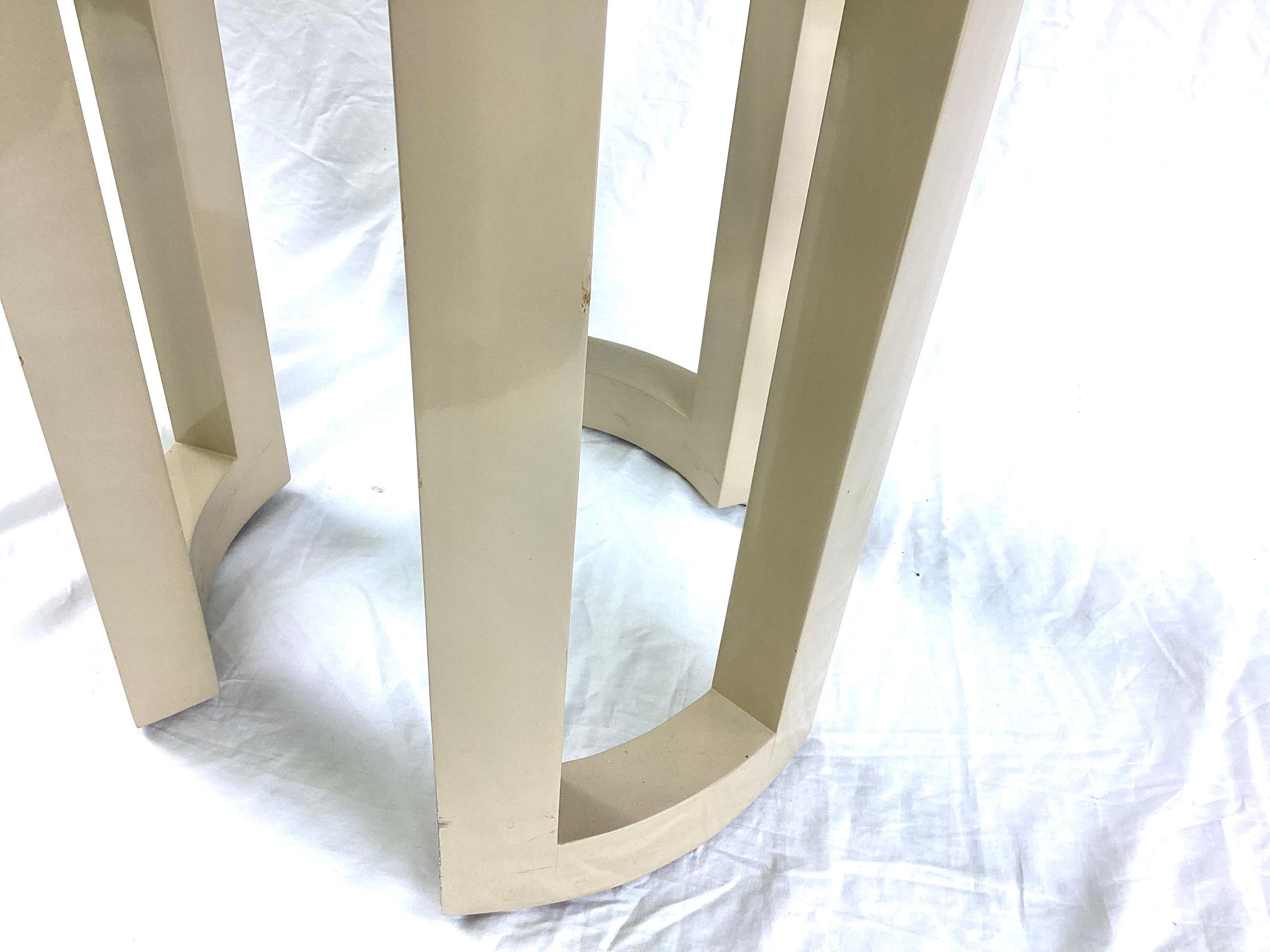 Modernist Tall Enameled Pedestal Stand Table. Great to put a beautiful sculpture or large lamp on. Stands 33 1/2 inches tall by 18 inches in diameter. Really nice condition with a couple of minor age-appropriate scratches and a small ding on the leg.