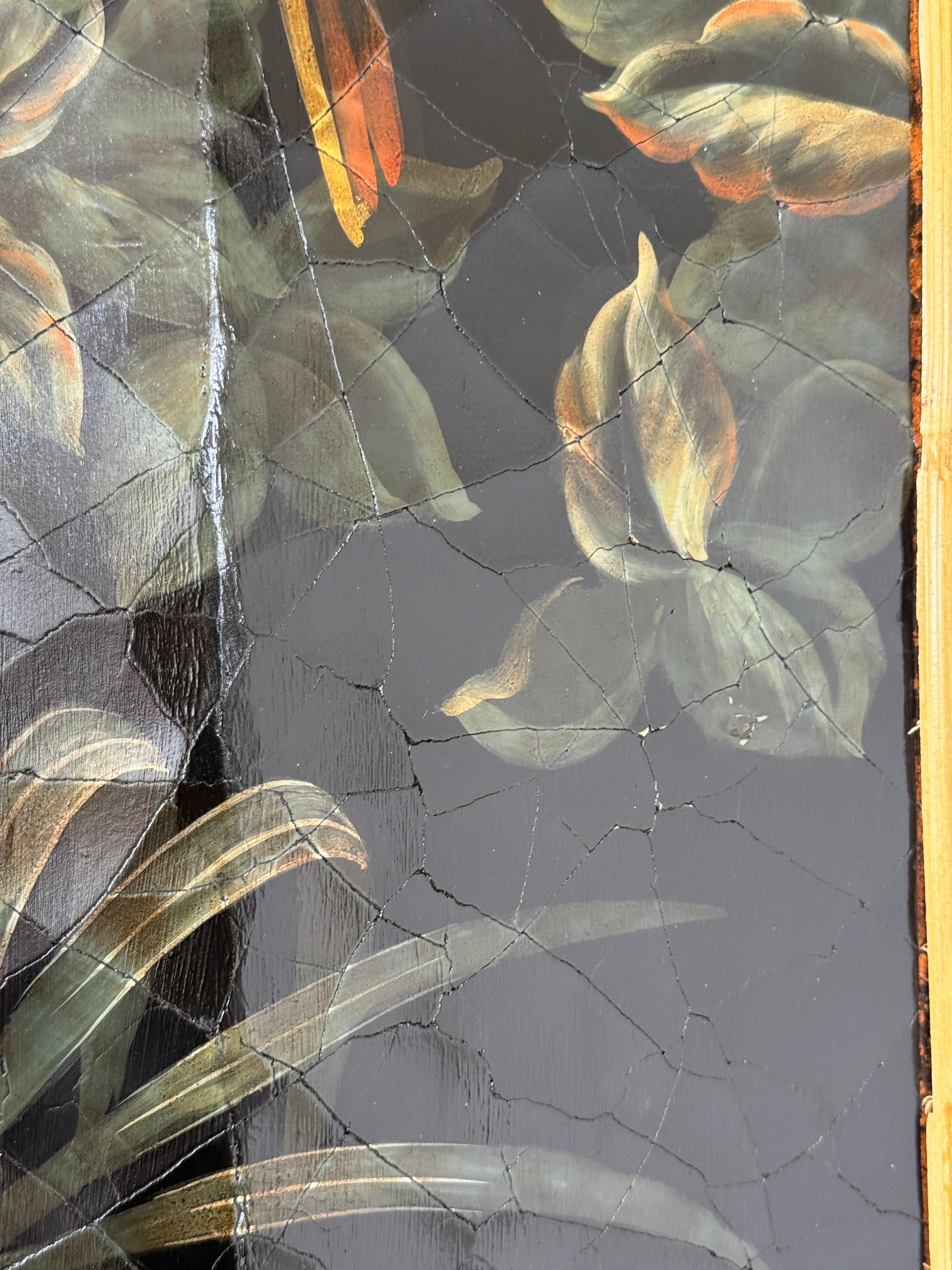 A spectacular late 20th century monumental tropical floor mirror featuring a richly hand-painted frame with exotic birds, monkeys, and lush foliage. Restored with added rattan strips to both the outer and inner borders, the frame has been reinforced