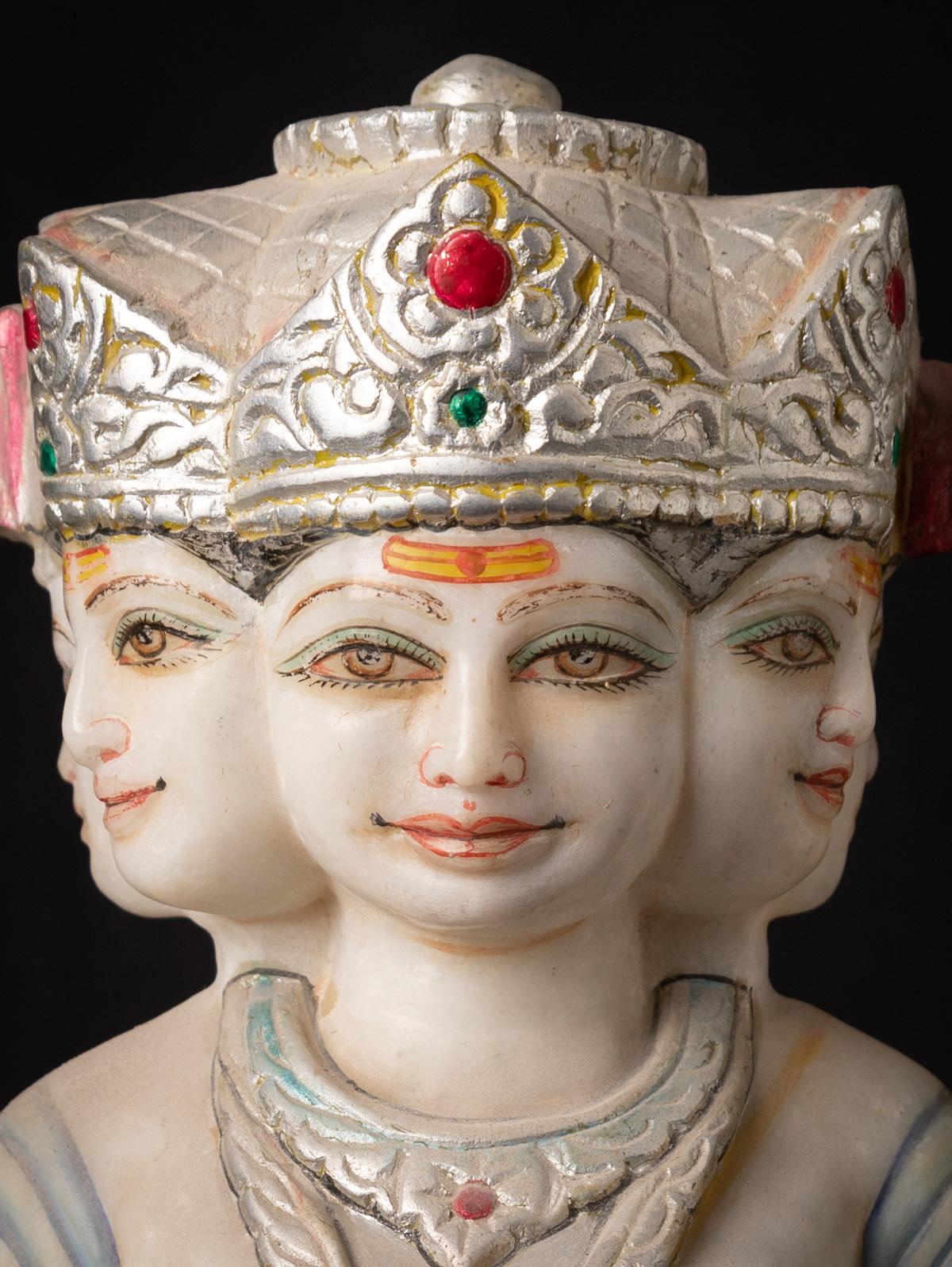 The Old marble Kartik statue is a magnificent work of art that exudes grace and beauty. Hand-carved from a single block of white marble, this statue stands at an impressive height of 38.7 cm and measures 25.3 cm in width and 12 cm in depth. Created