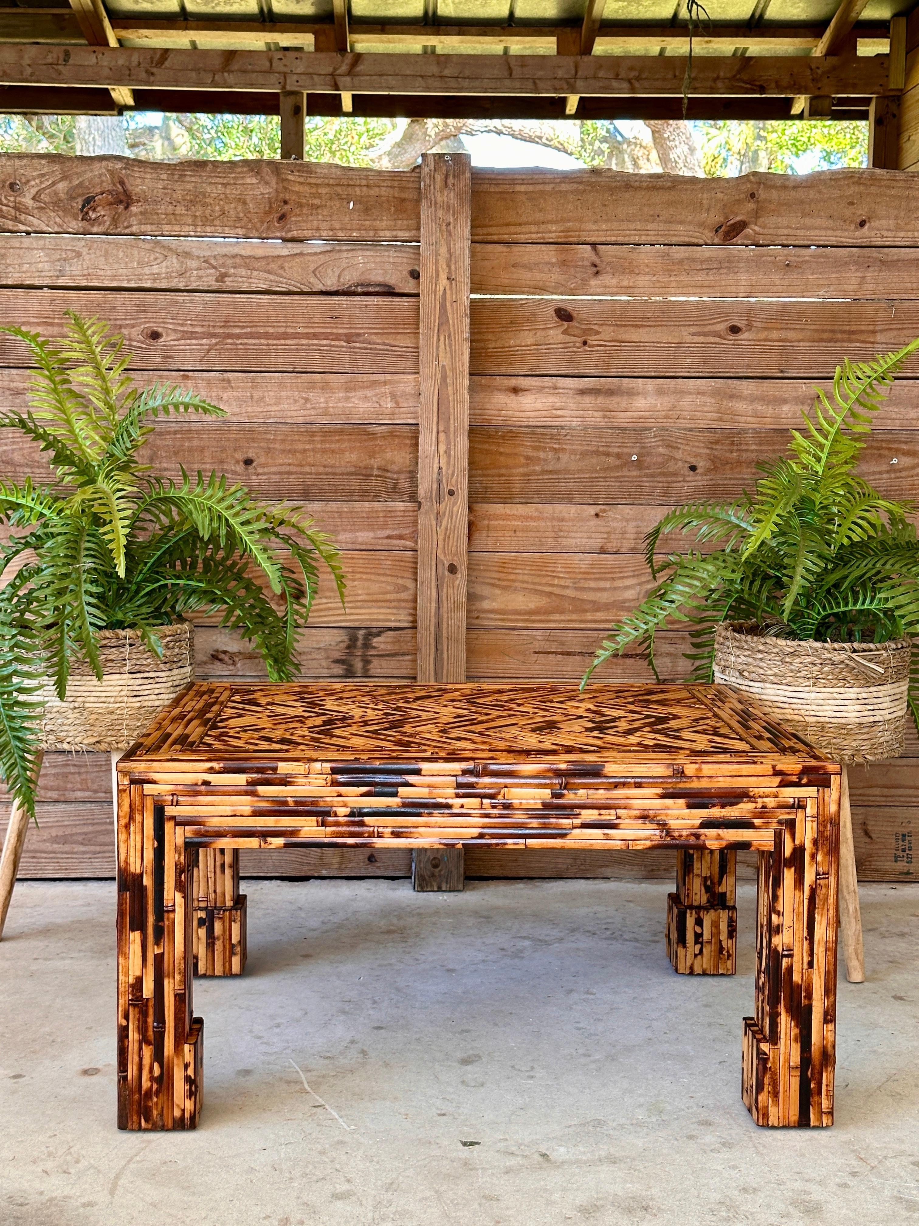A stunning example of Harrison Van Horn’s craftsmanship, this late 20th-century coffee table is constructed of meticulously arranged split bamboo in a geometric parquet pattern.
The table has been meticulously refinished to enhance its natural warm