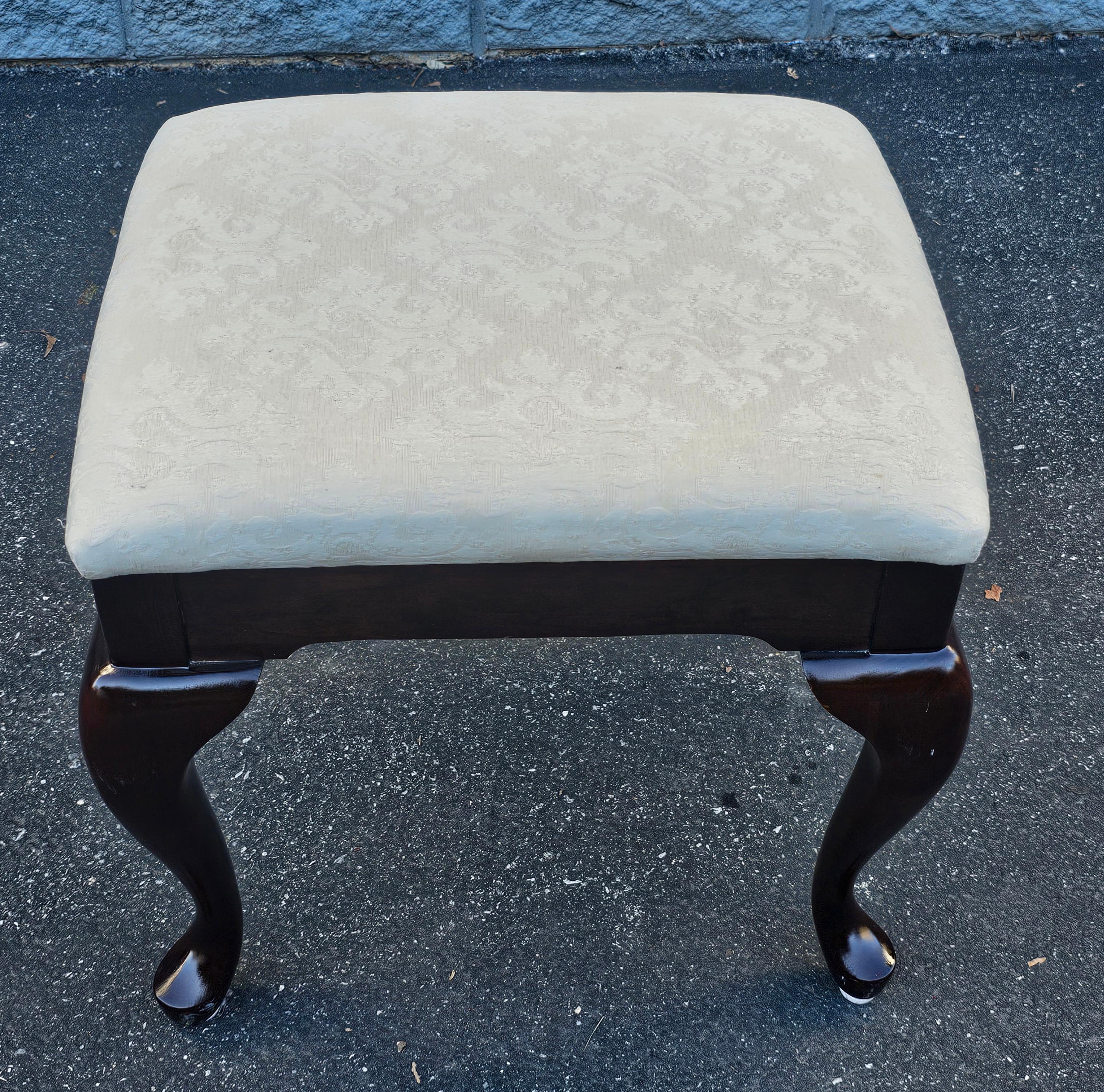 A Late 20th Century Queen Anne Styly Solid Cherry and Upholstered Vanity Bench. Measures 20
