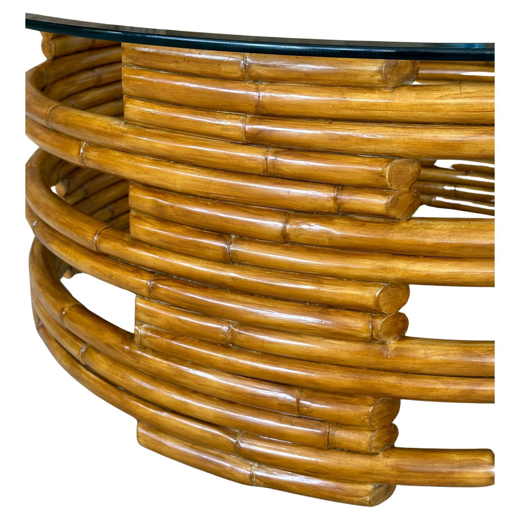 Fantastic coastal organic modern circular rattan coffee table with original glass that has been refinished by Ralph Lauren.
Beautifully refinished piece great for a Coastal modern style.
Base without glass 37x16 high

Please zoom in on all photos